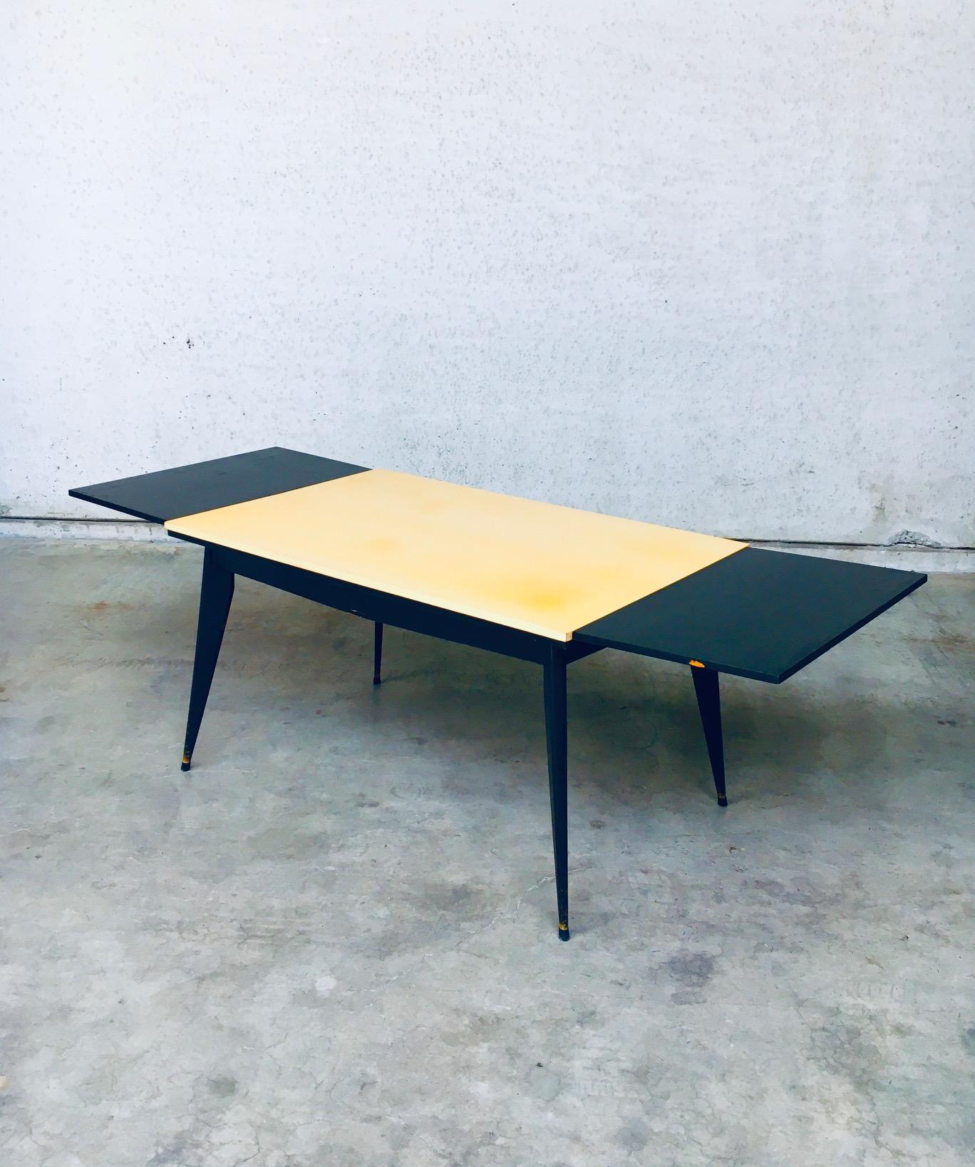 Wood 1950's Space Age Design Extendable Dining Table For Sale