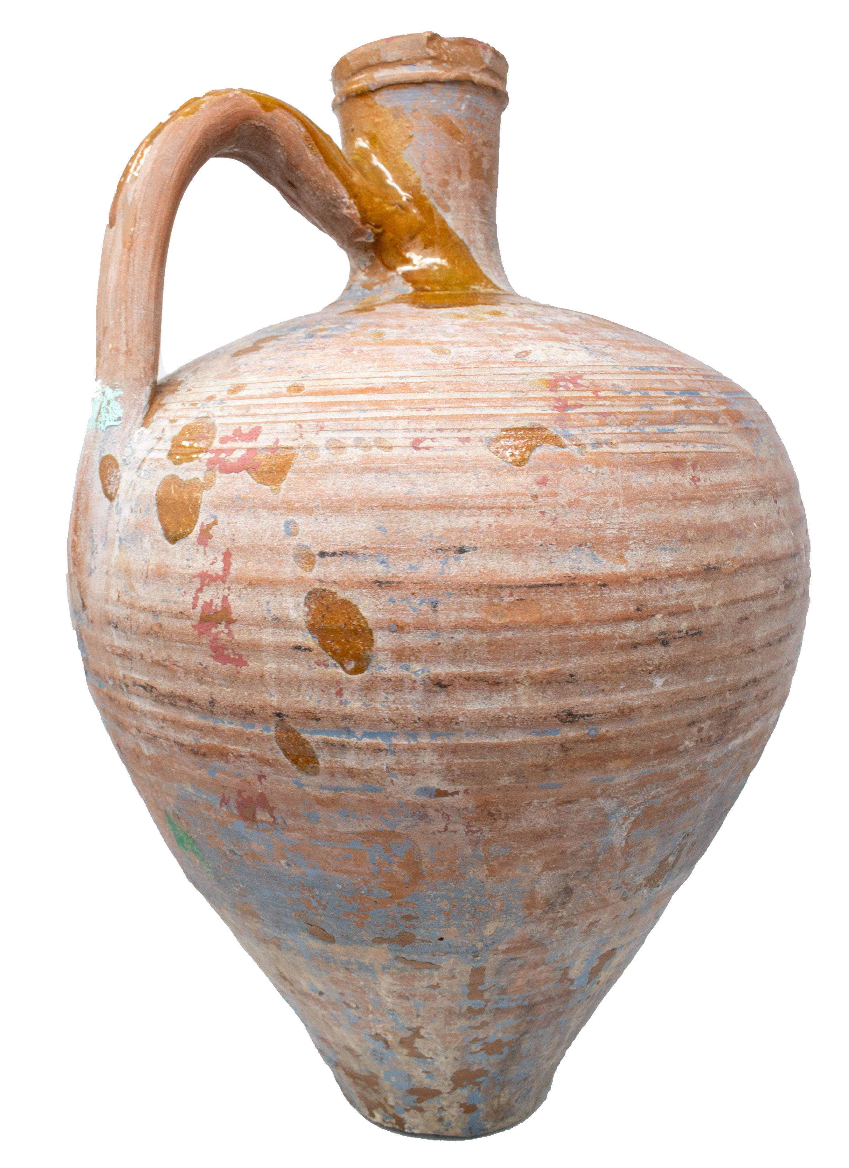 1950s Spanish Andalusian handmade terracotta vase splashed with brown glazing.