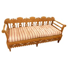 1950s Spanish Bench Carved in Wood with a Newly Upholstered Striped Cushion