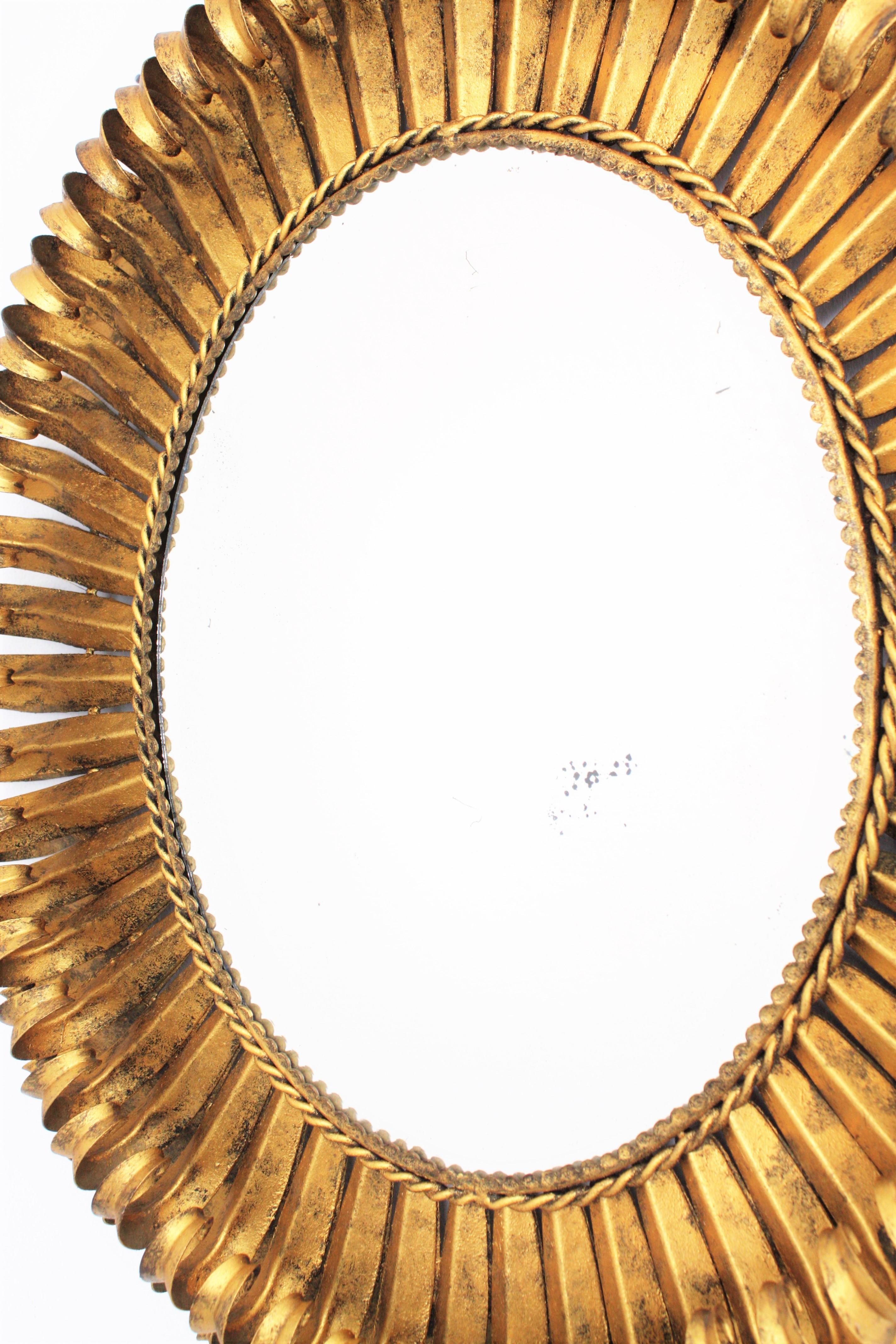 1950s Spanish Brutalist Hammered Gilt Metal Eyelash Oval Sunburst Mirror  3