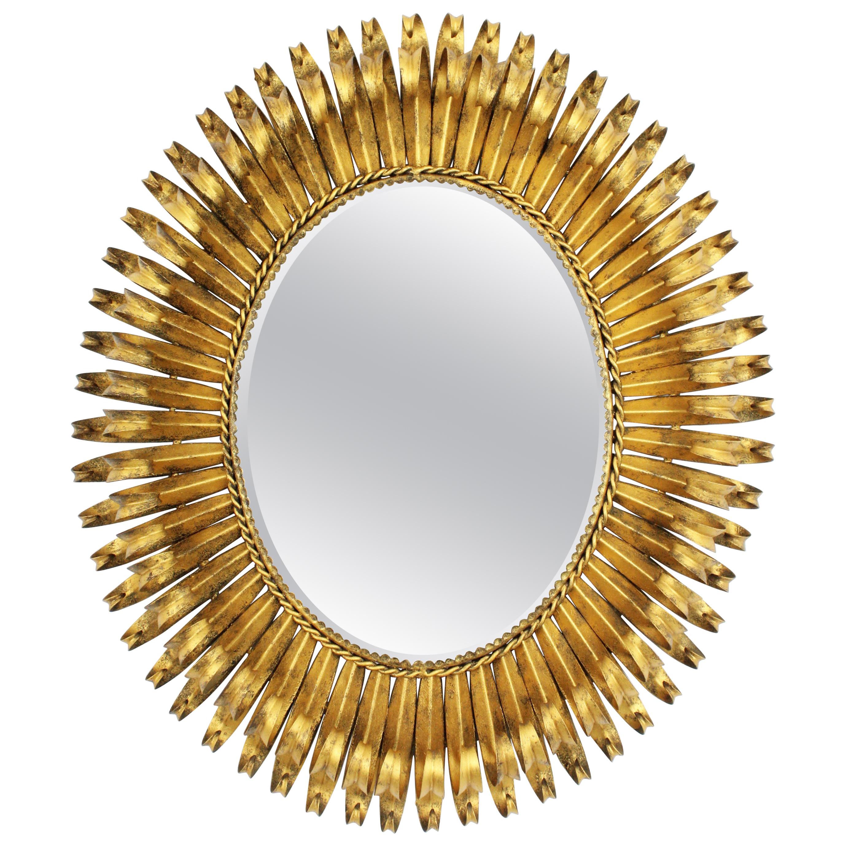 1950s Spanish Brutalist Hammered Gilt Metal Eyelash Oval Sunburst Mirror 