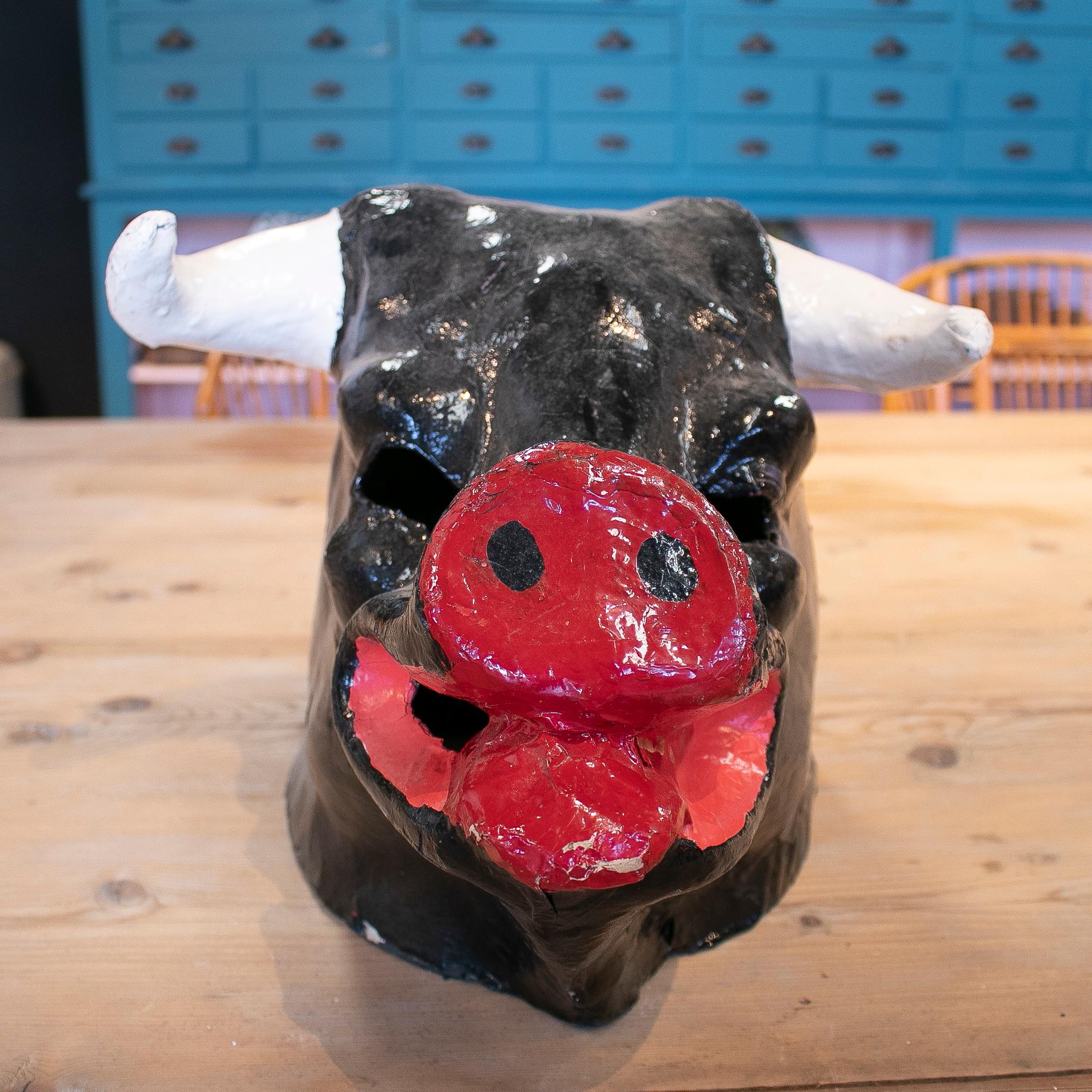 Popular 1950s Spanish bull head hand painted papier-mâché mask worn during village festivals.
  