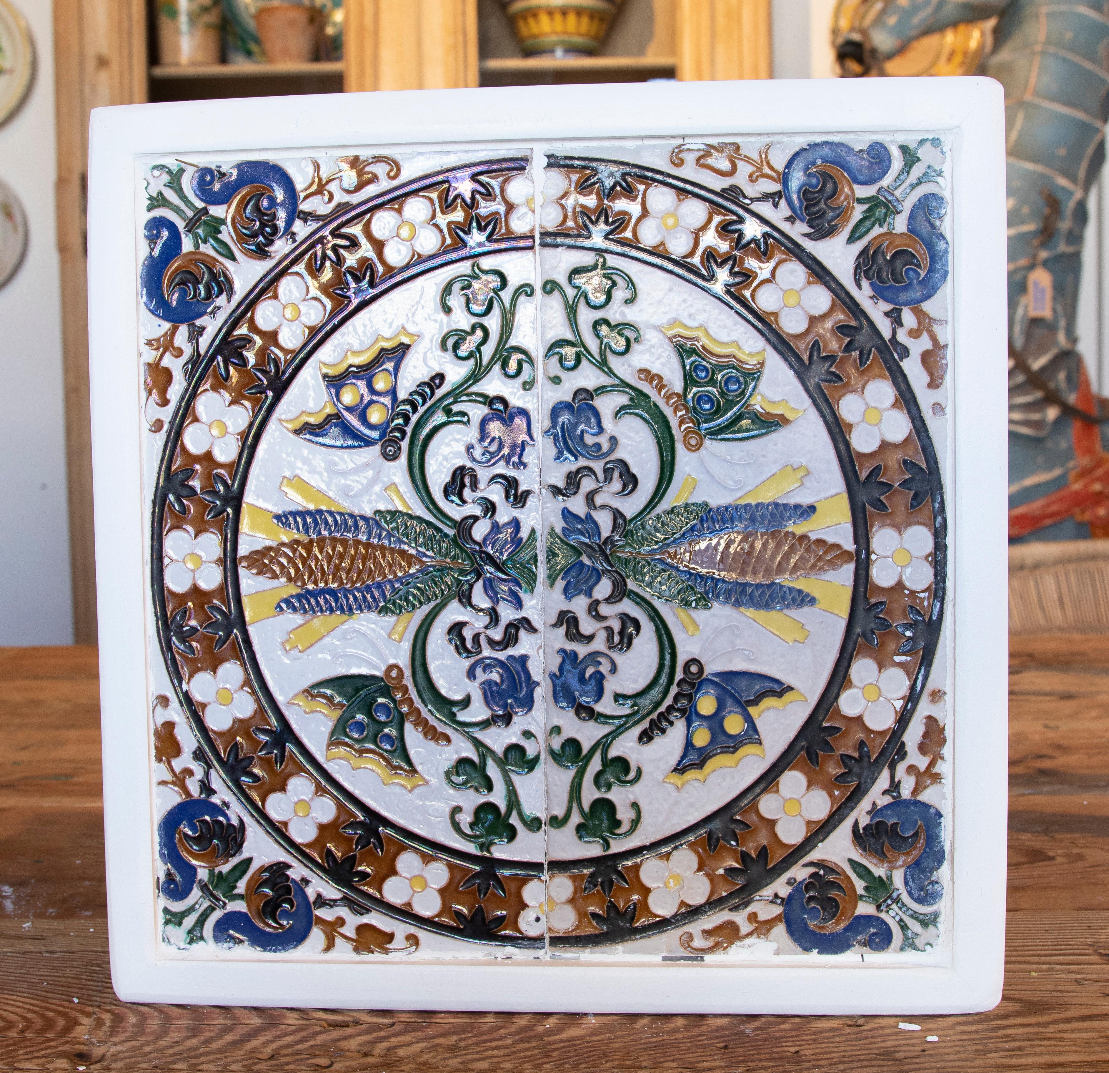 1950s Spanish decorative tile framed in wood in different colours.
