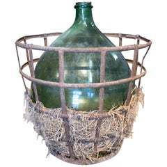 Vintage 1950s Spanish Glass Blown Wine Demijohn in its Iron Basket Cover