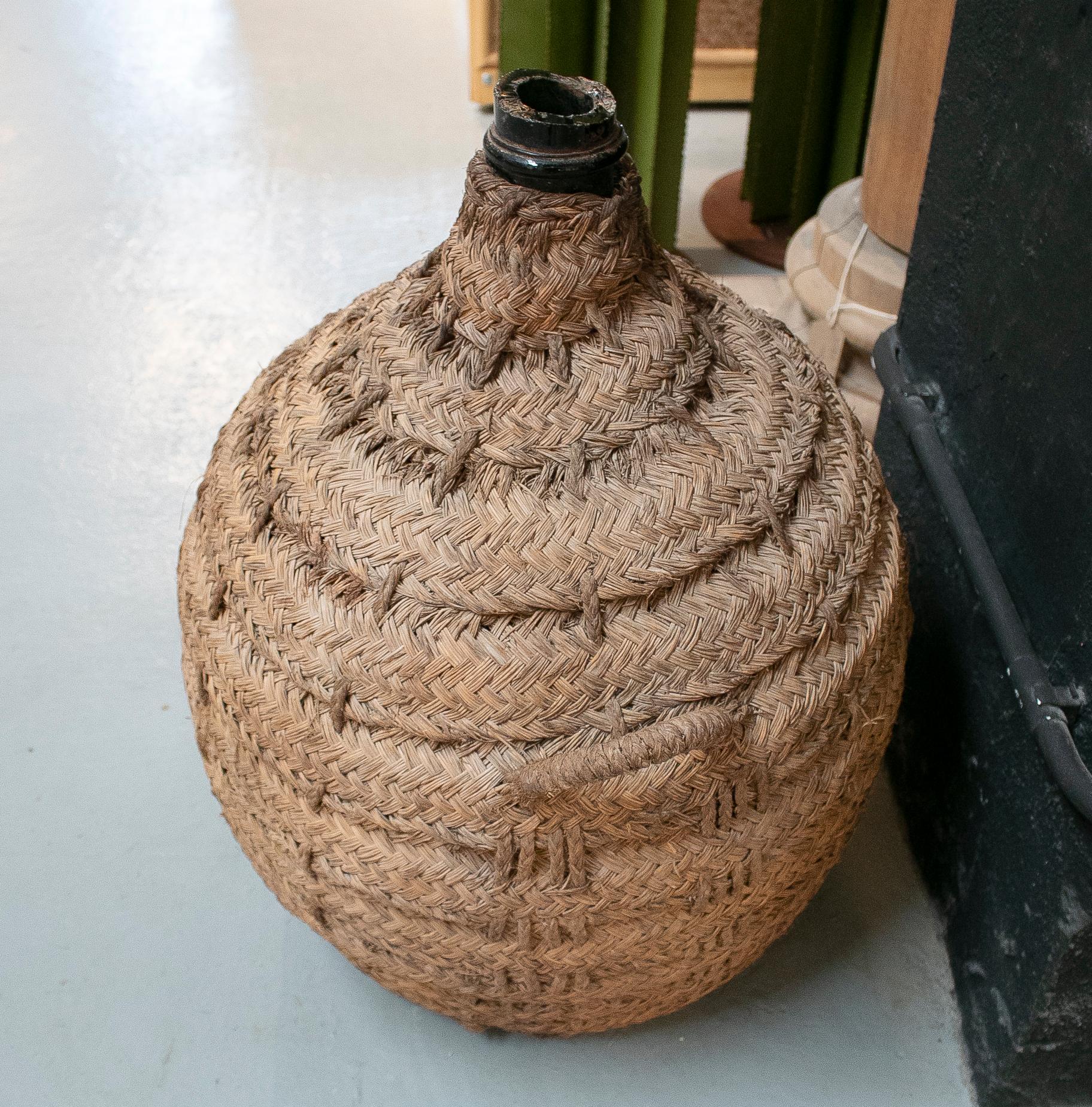 Rope 1950s Spanish Glass Demijohn in Hand Woven Esparto Grass Basket