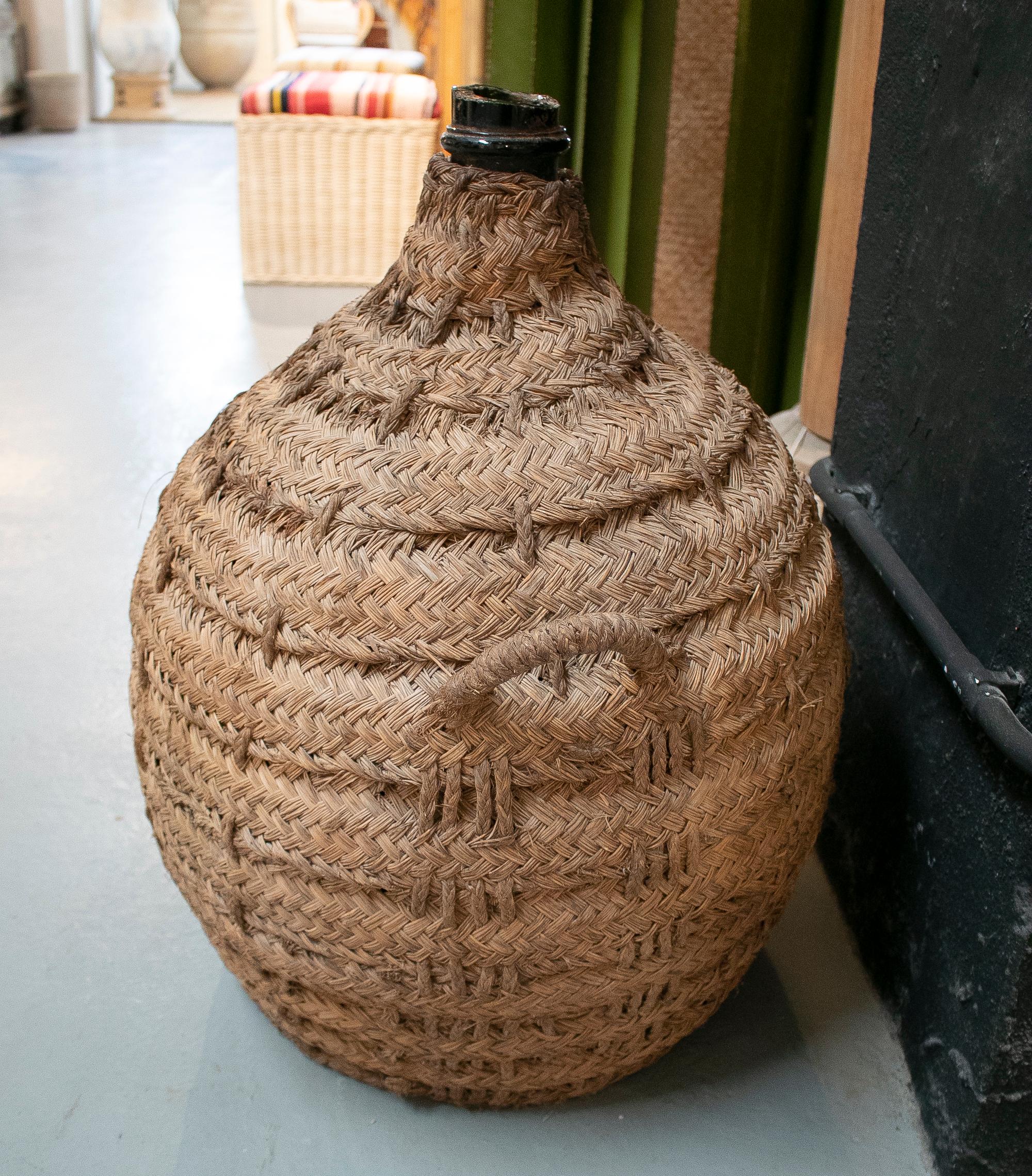 1950s Spanish Glass Demijohn in Hand Woven Esparto Grass Basket 1
