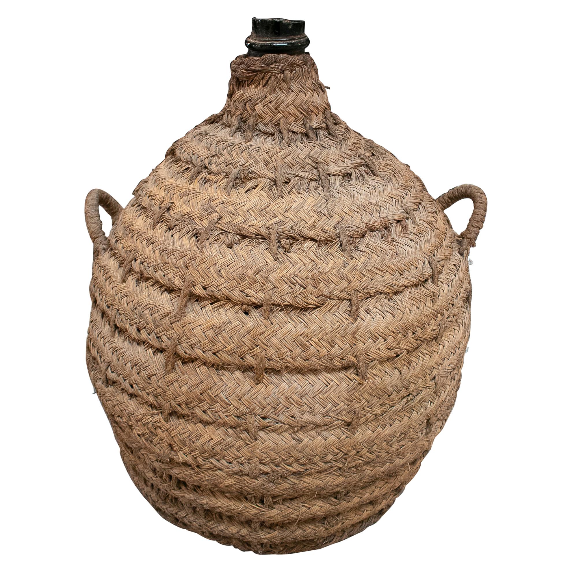 1950s Spanish Glass Demijohn in Hand Woven Esparto Grass Basket