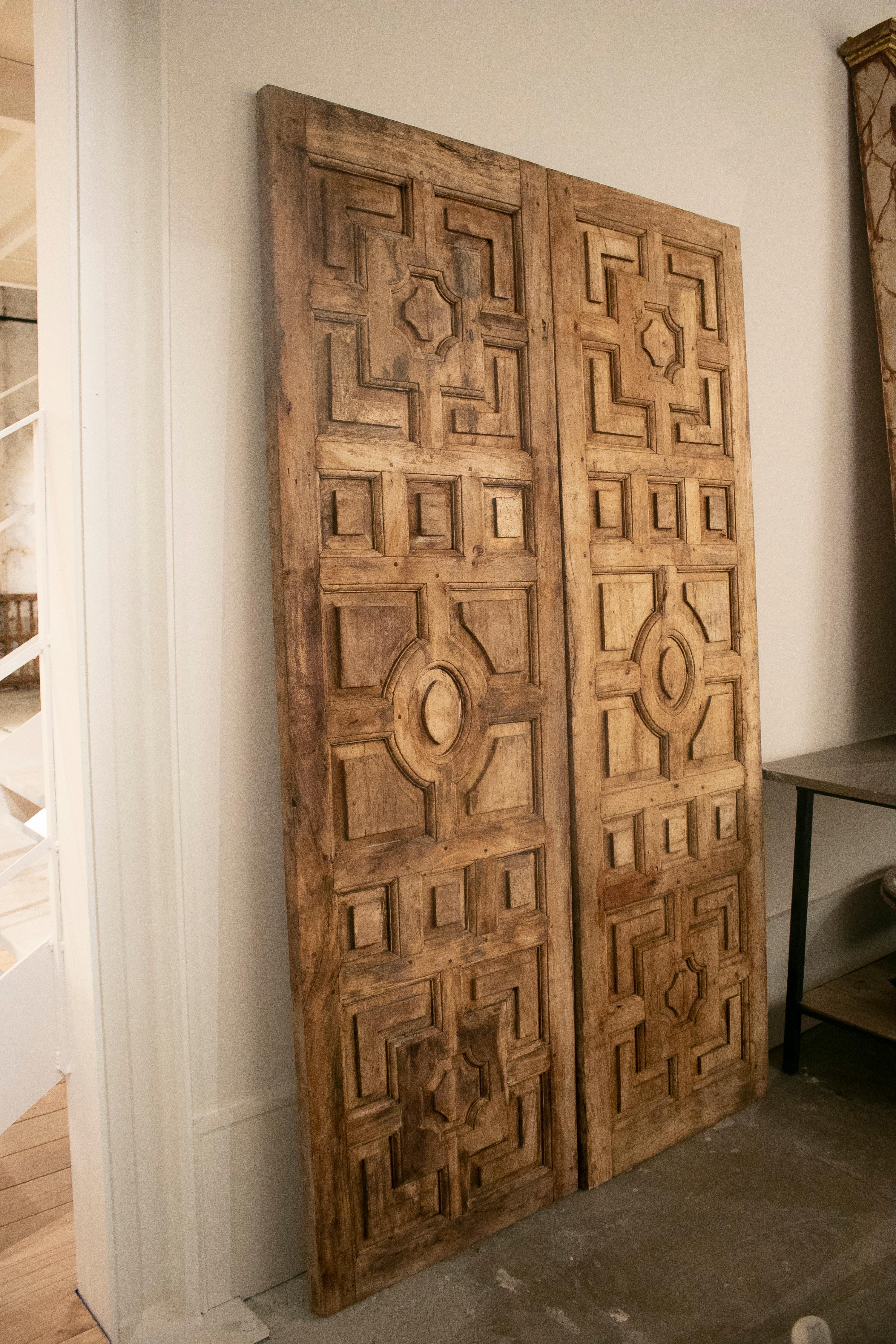 1950s Spanish hand carved elm wood paneled double door.