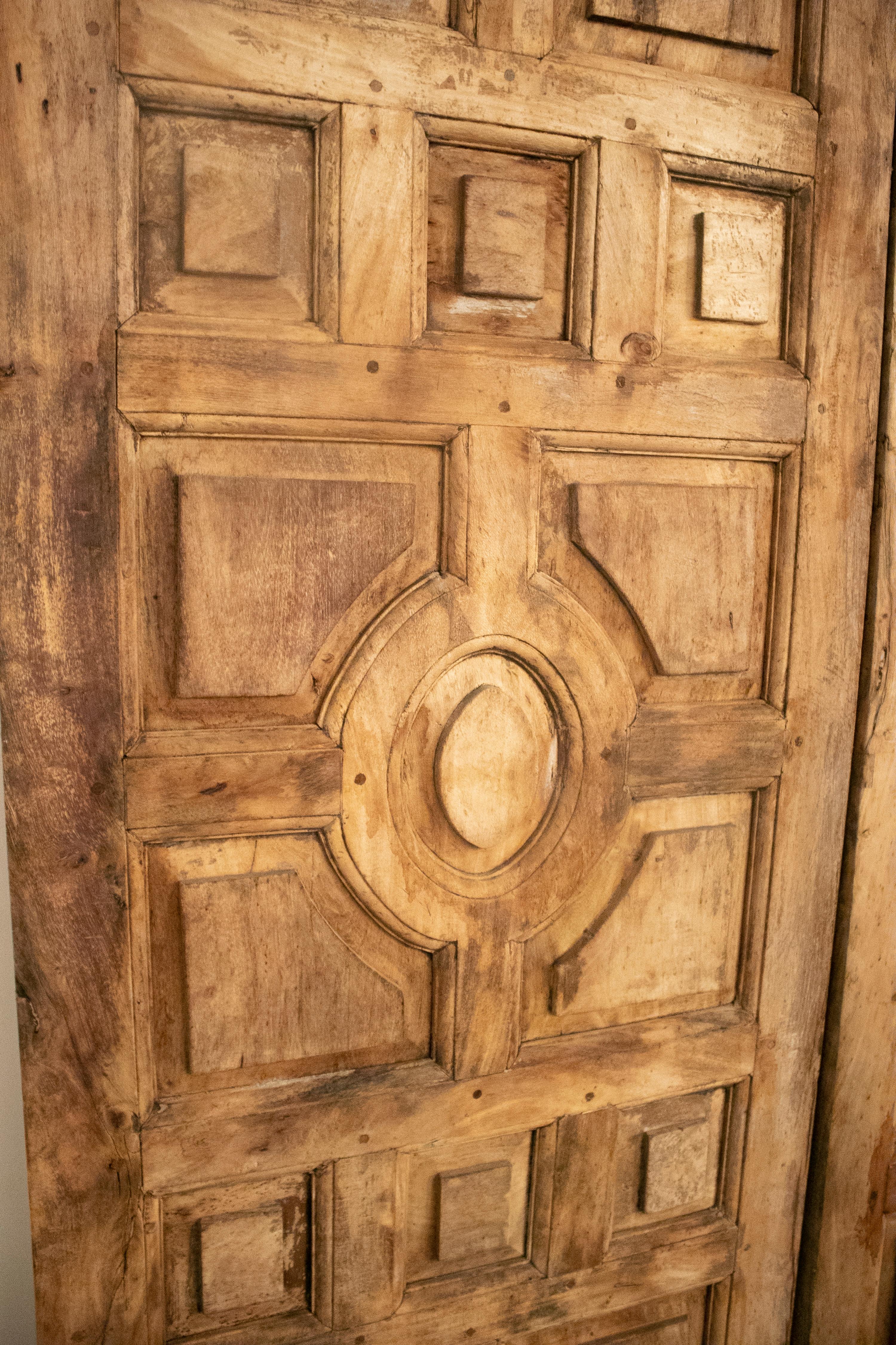 20th Century 1950s Spanish Hand Carved Elm Wood Paneled Double Door
