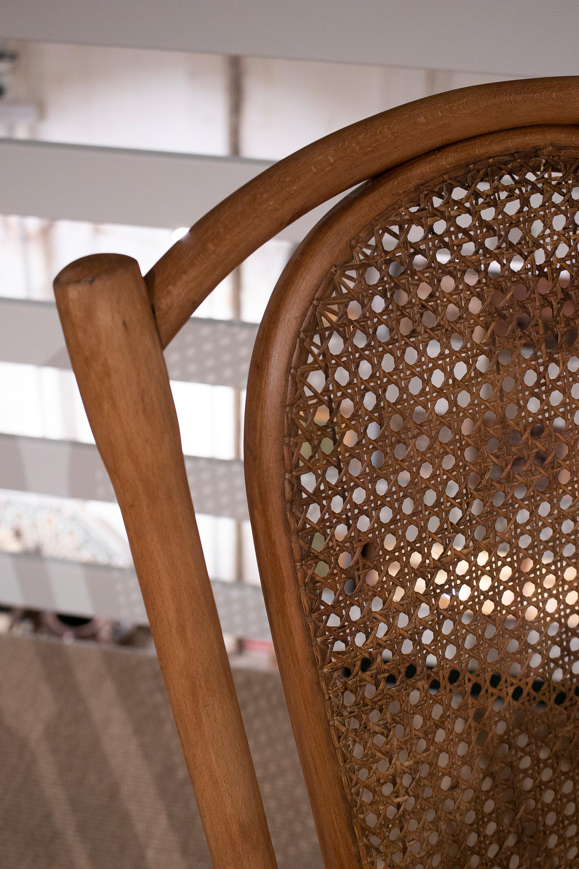 1950s Spanish Hand Woven Wicker Wooden Rocking Chair For Sale 1