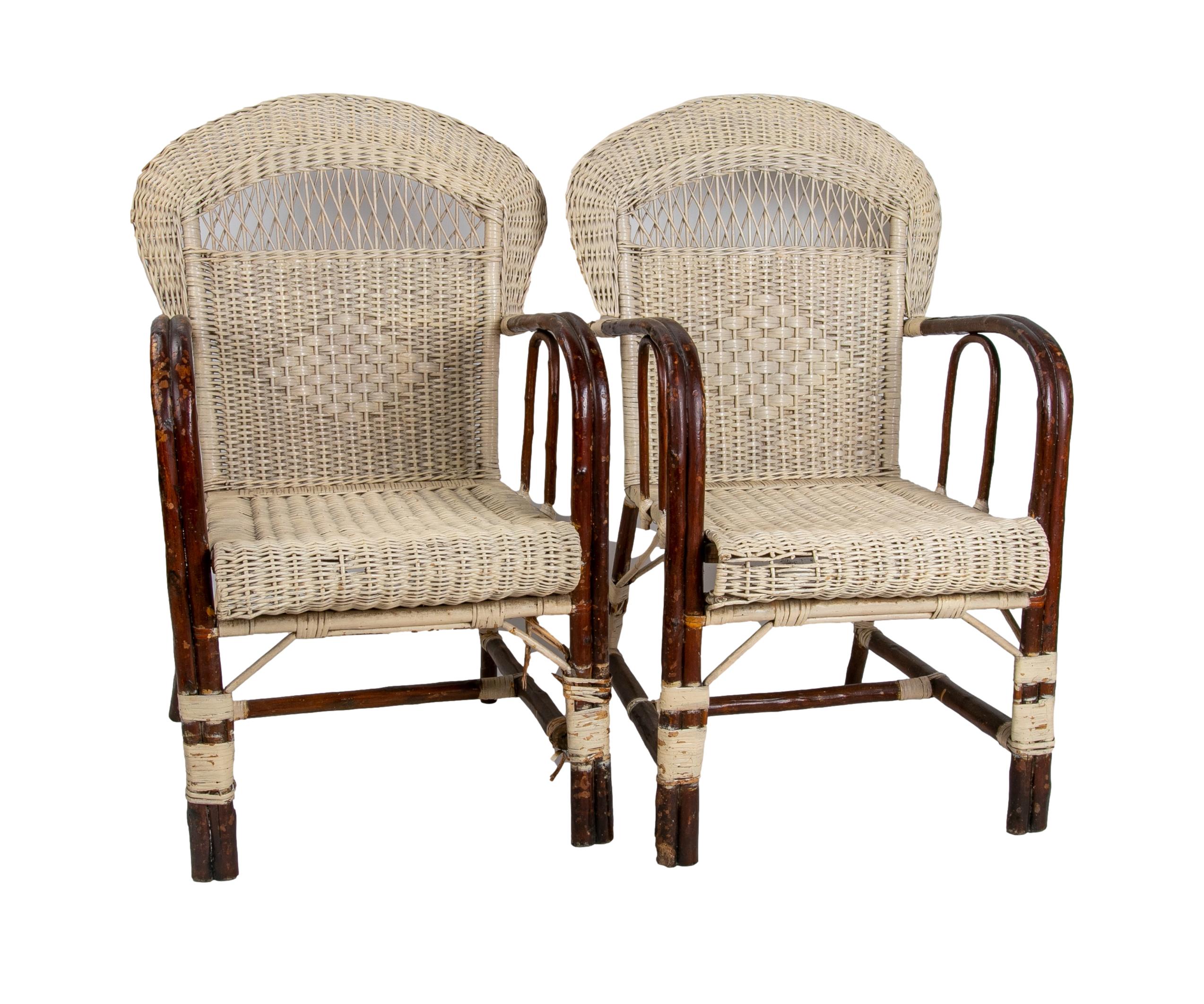 1950s Spanish pair of handmade wicker armchairs.