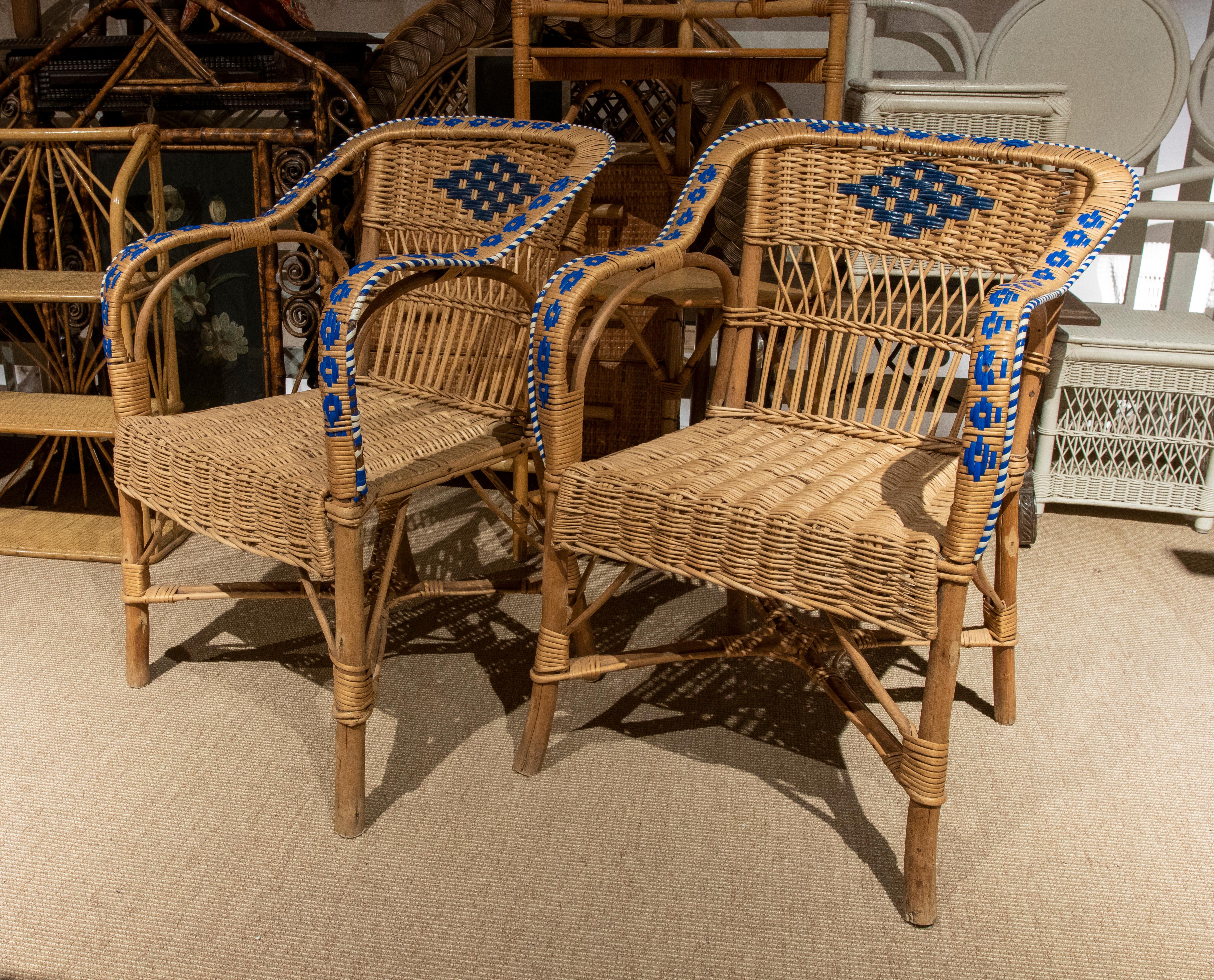 1950s Spanish pair of handmade wicker armchairs.