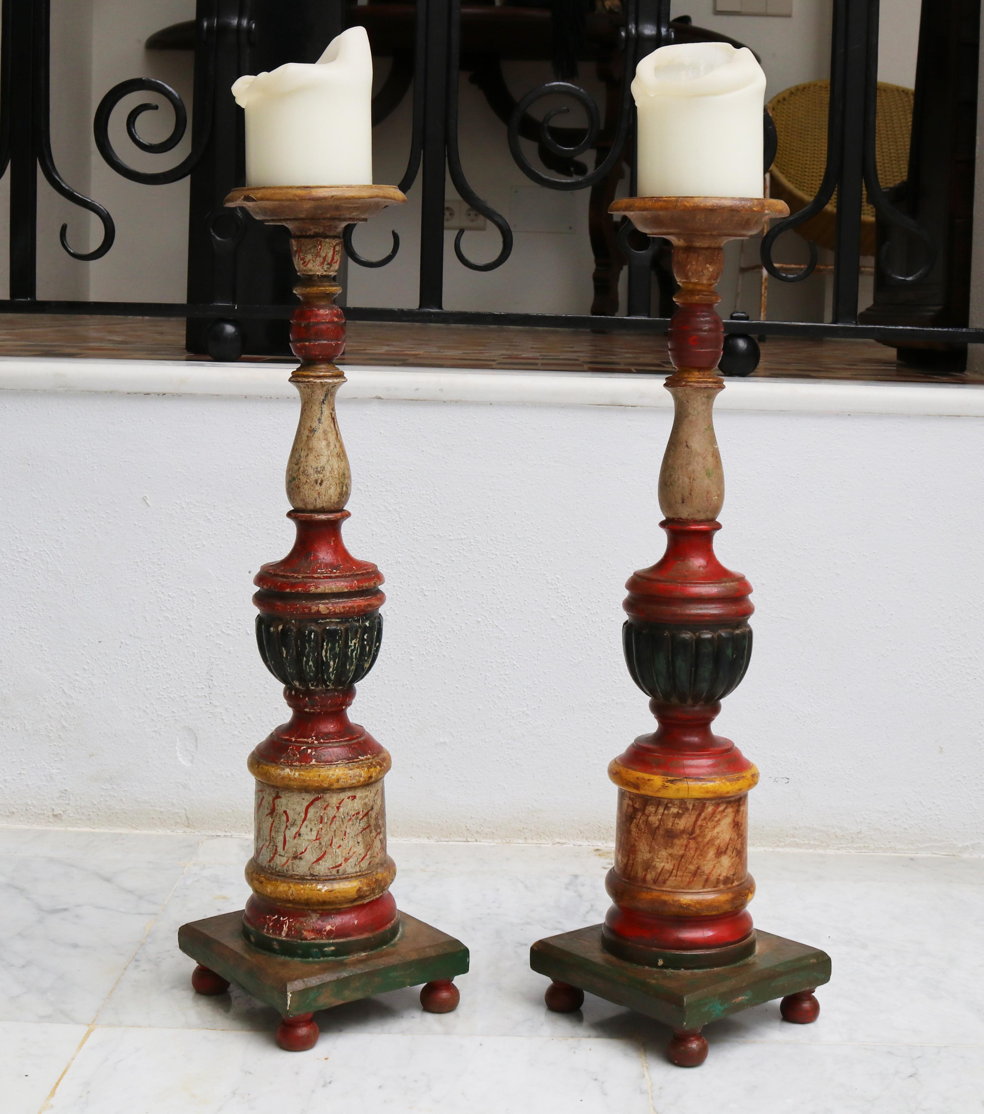 1950s Spanish pair of wooden painted candle pricket sticks.