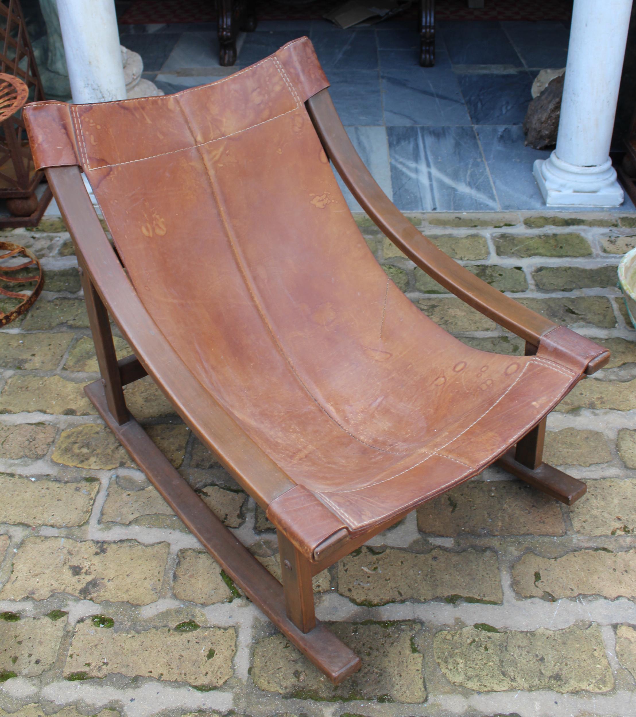1950s Spanish wood and leather rocking chair made by and stamped 