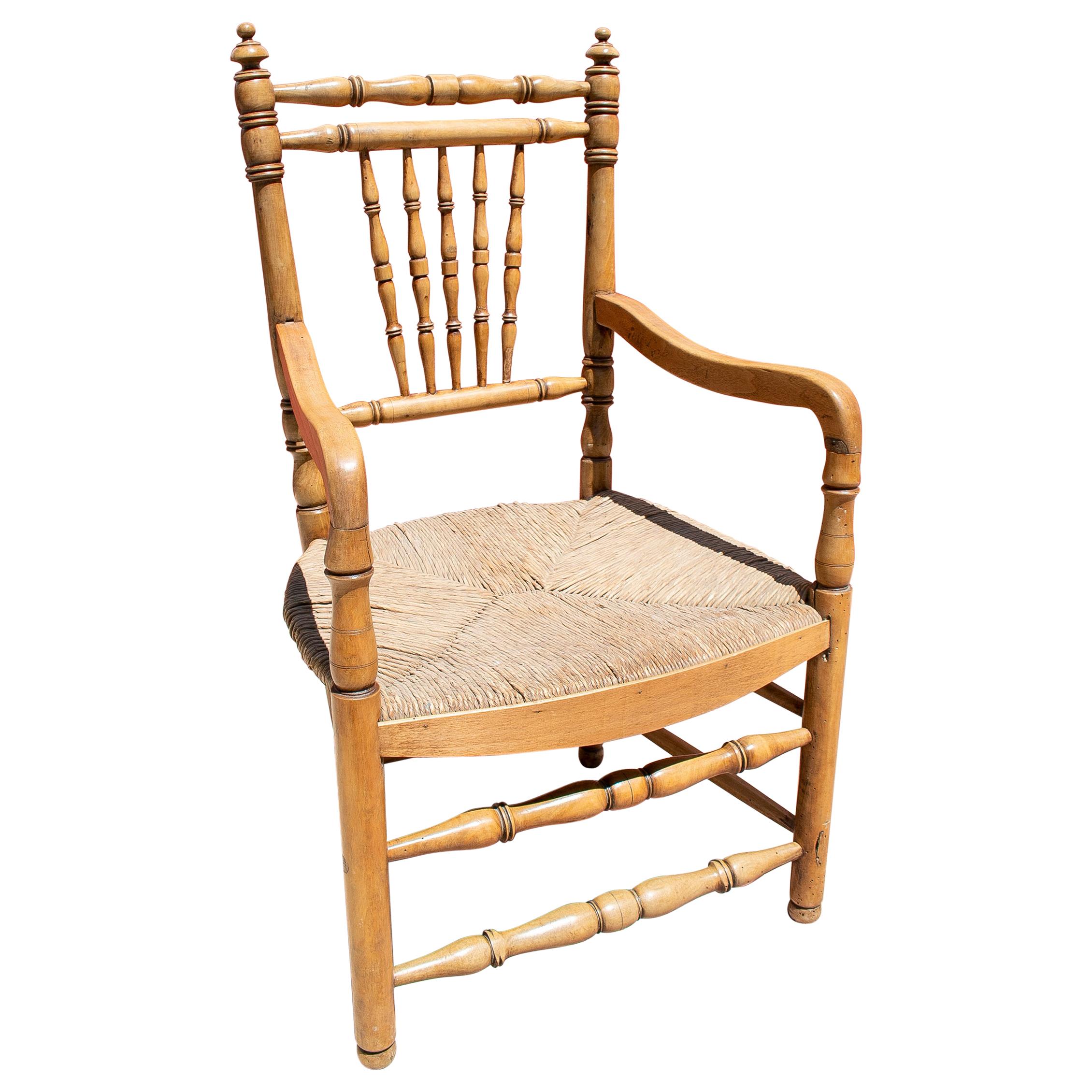1950s Spanish Woven Rope Bottomed Wooden Armchair w/ Spindle Legs For Sale