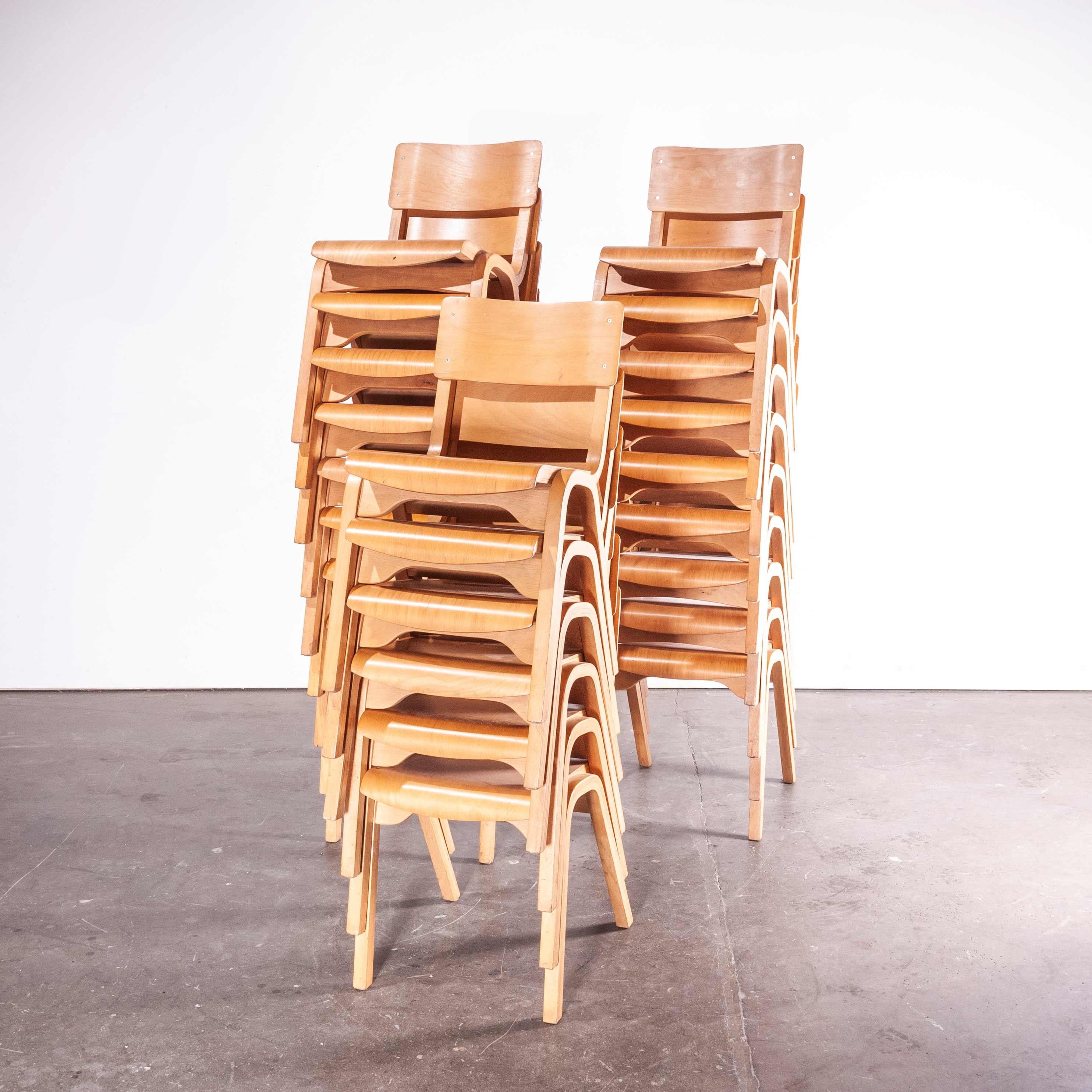 1950s stacking dining chairs by Lamstak, set of twenty four
1950s stacking dining chairs by Lamstak, set of twenty four. Lamstak was a large producer of chairs in the midcentury period. They pioneered making chairs using laminated beech bentwood