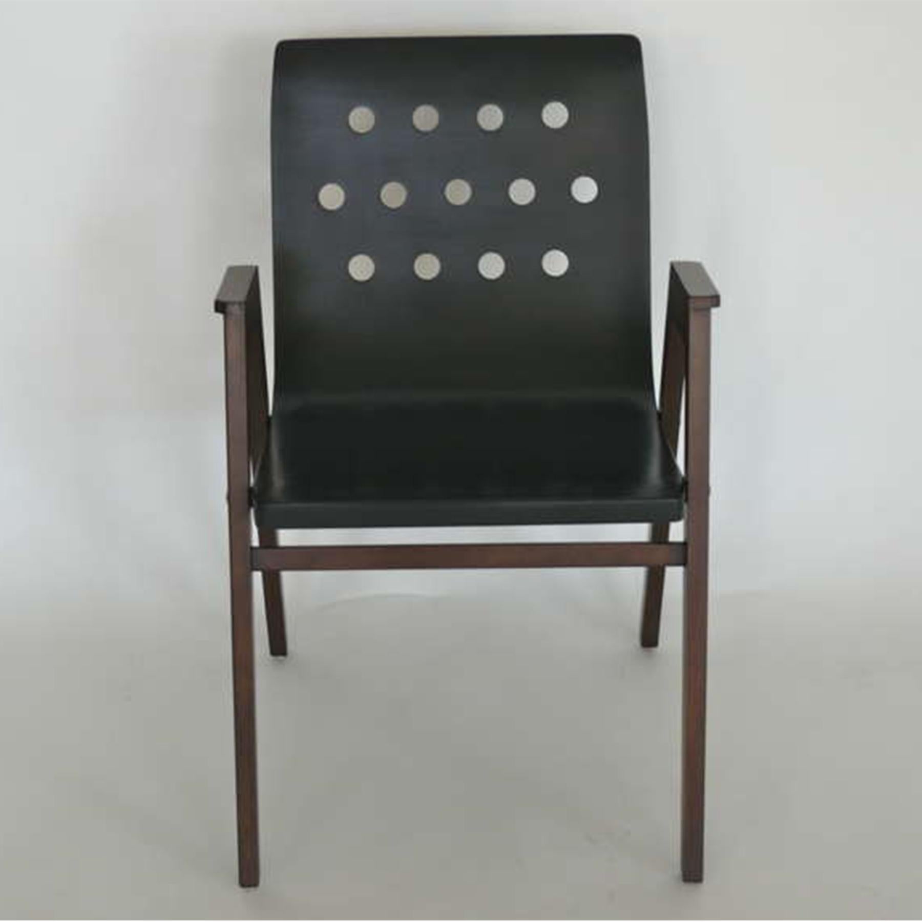 Fantastic set of six stackable armchairs designed by Roland Rainer. Originally designed for the Viennese Town Hall by A & E Pollak. Newly refinished beechwood angled arms and legs in a deep brown finish. Seats and perforated backrests are made of