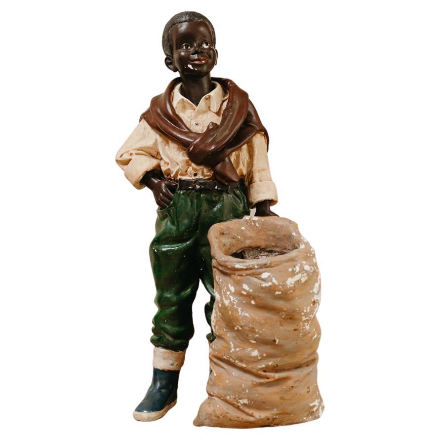 Statue d'un garçon charmant et séduisant, datant des années 1950 en vente