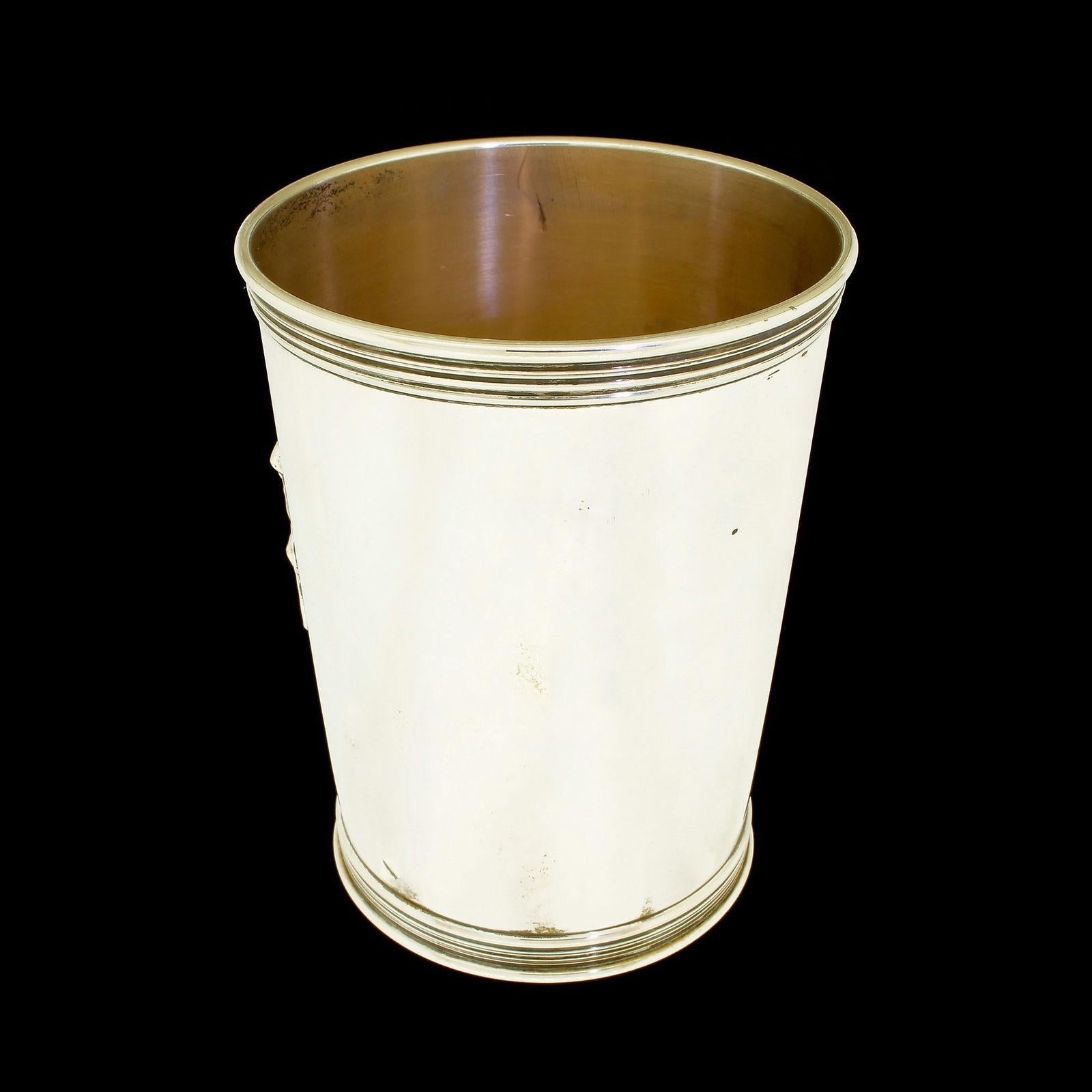Beautiful vintage sterling silver Mint Julep cup made by Benjamin Trees of KY and retailed by S Penn & Son's.
One owner, no monograms either applied or removed and these have been stored for many years.
The cup was purchased in the late 1950's and