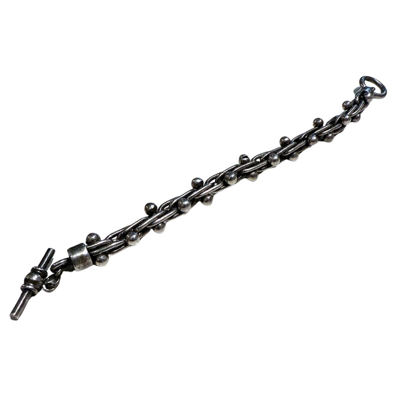 1950s Sterling Silver Toggle Bracelet Ball DNA Cha Cha Mexico Taxco
stamped 925
design attributed to William Spratling
7 long x .38 diameter
Preowned vintage condition
Refer to images