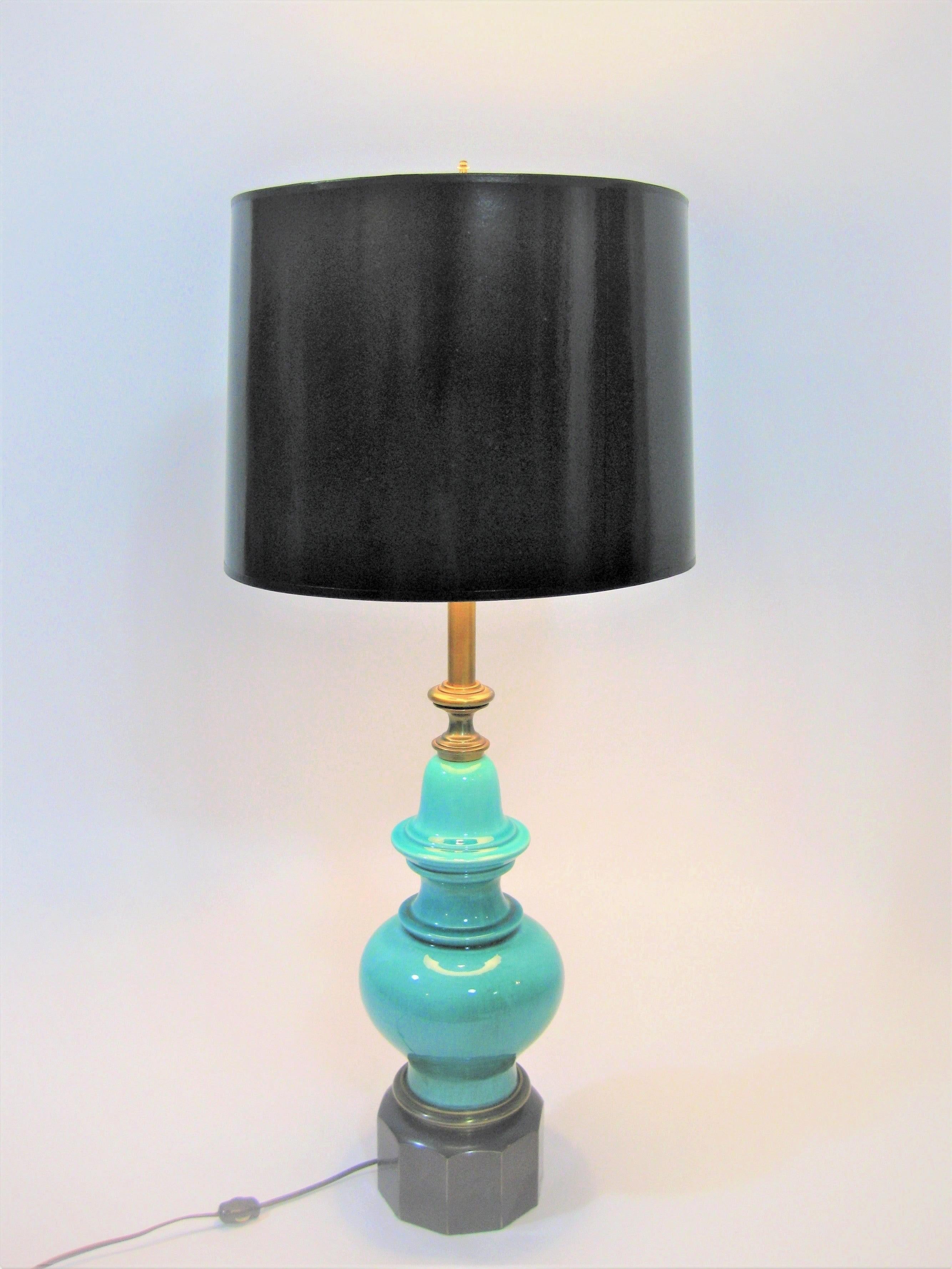 1950s Vibrant color of turquoise. Crackle glazed ceramic. Substantial weight. Brass details and finial. Stiffel Markings. Made in America. Shade is for photo purposes and not included. Fabulous and Versatile Lamp! Excellent condition.
