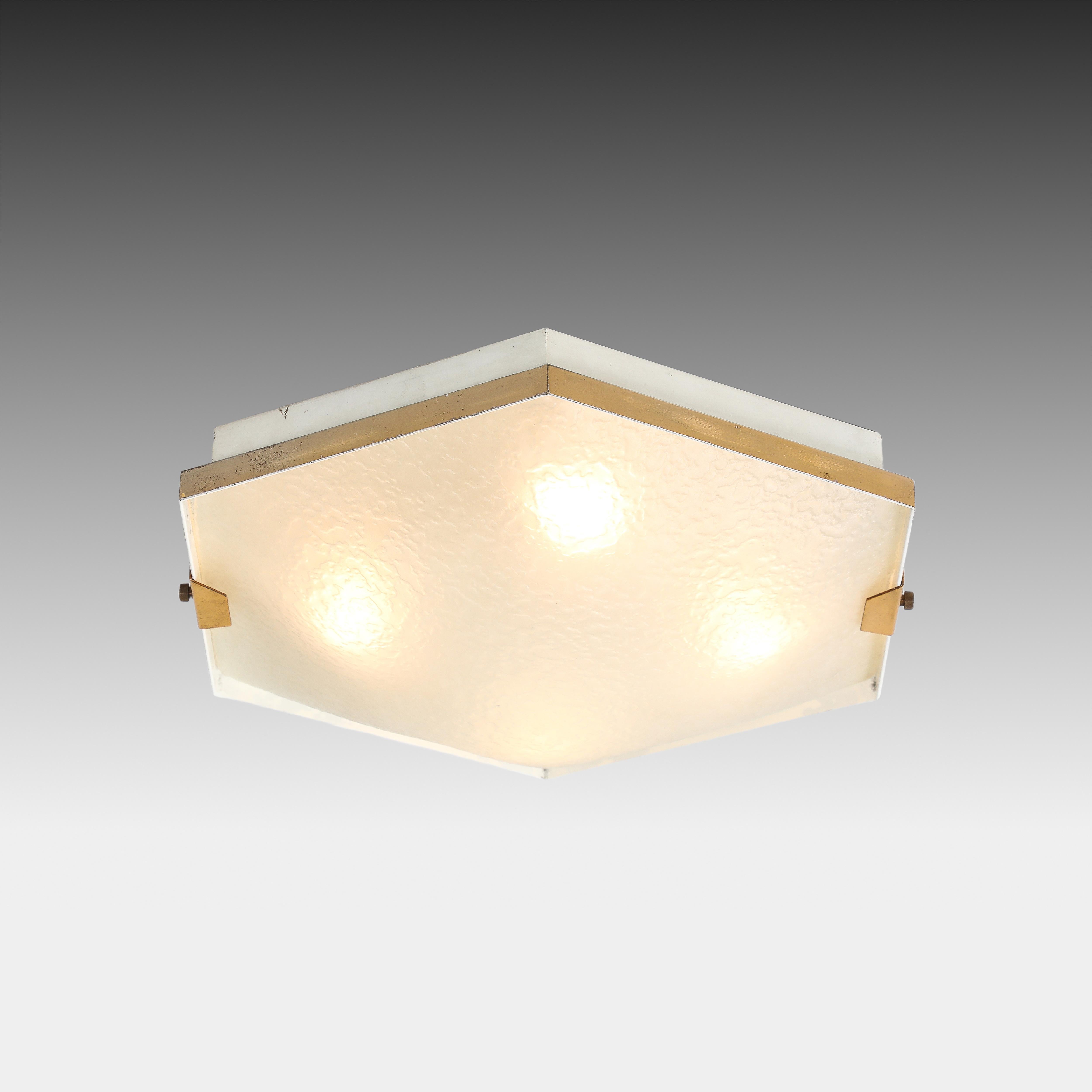 1960s Stilnovo hexagonal flush mount ceiling light with white enameled metal structure, textured glass diffuser, and brass mounts.  
Stamped 'STILNOVO' on inside of metal structure.