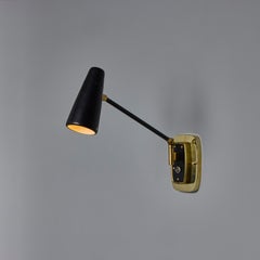 1950s Stilnovo Perforated Black Metal and Brass Sconce with Stamped Label