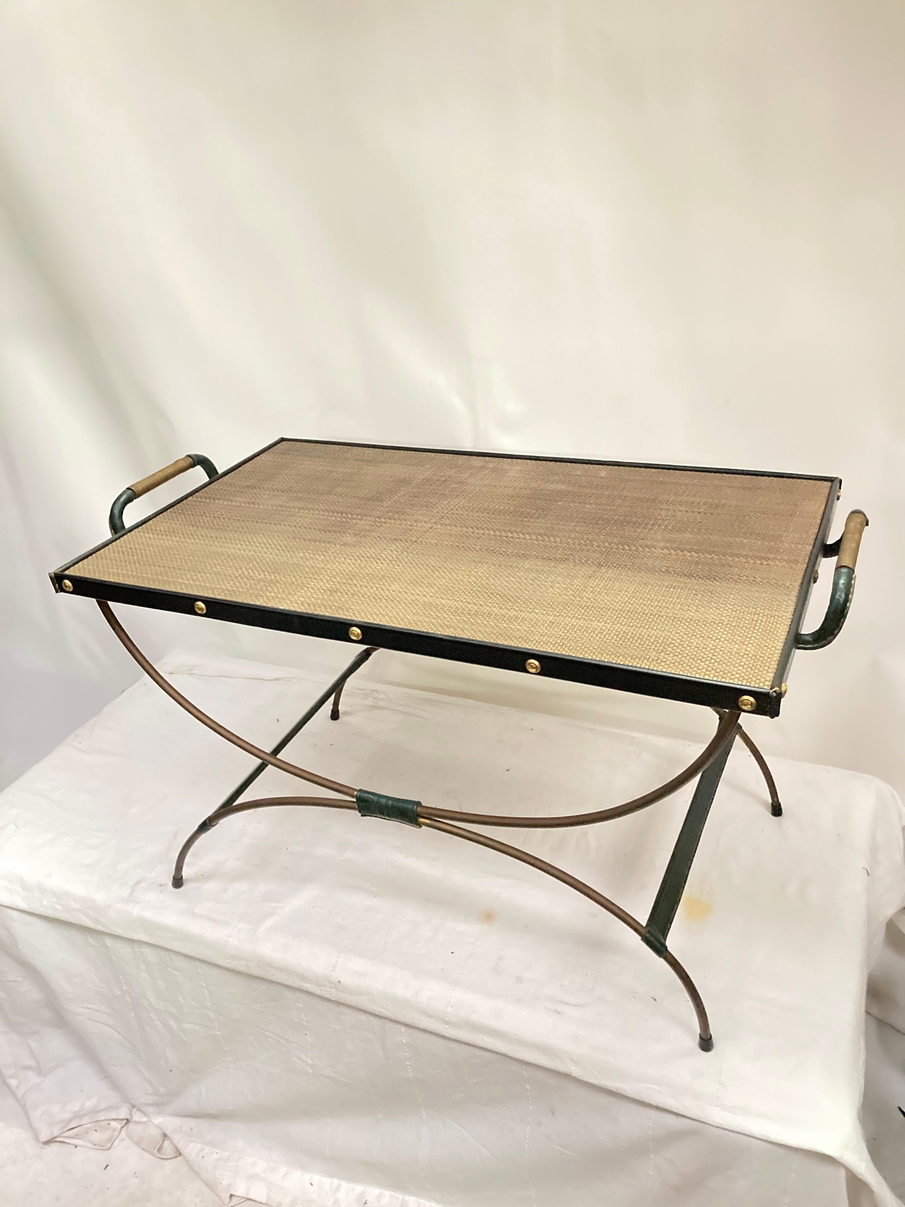 1950's Stitched leather and brass cocktail table
Black and dark green leather
Real leather as rattan imitation
Dersigned by Jacques Adnet
France
