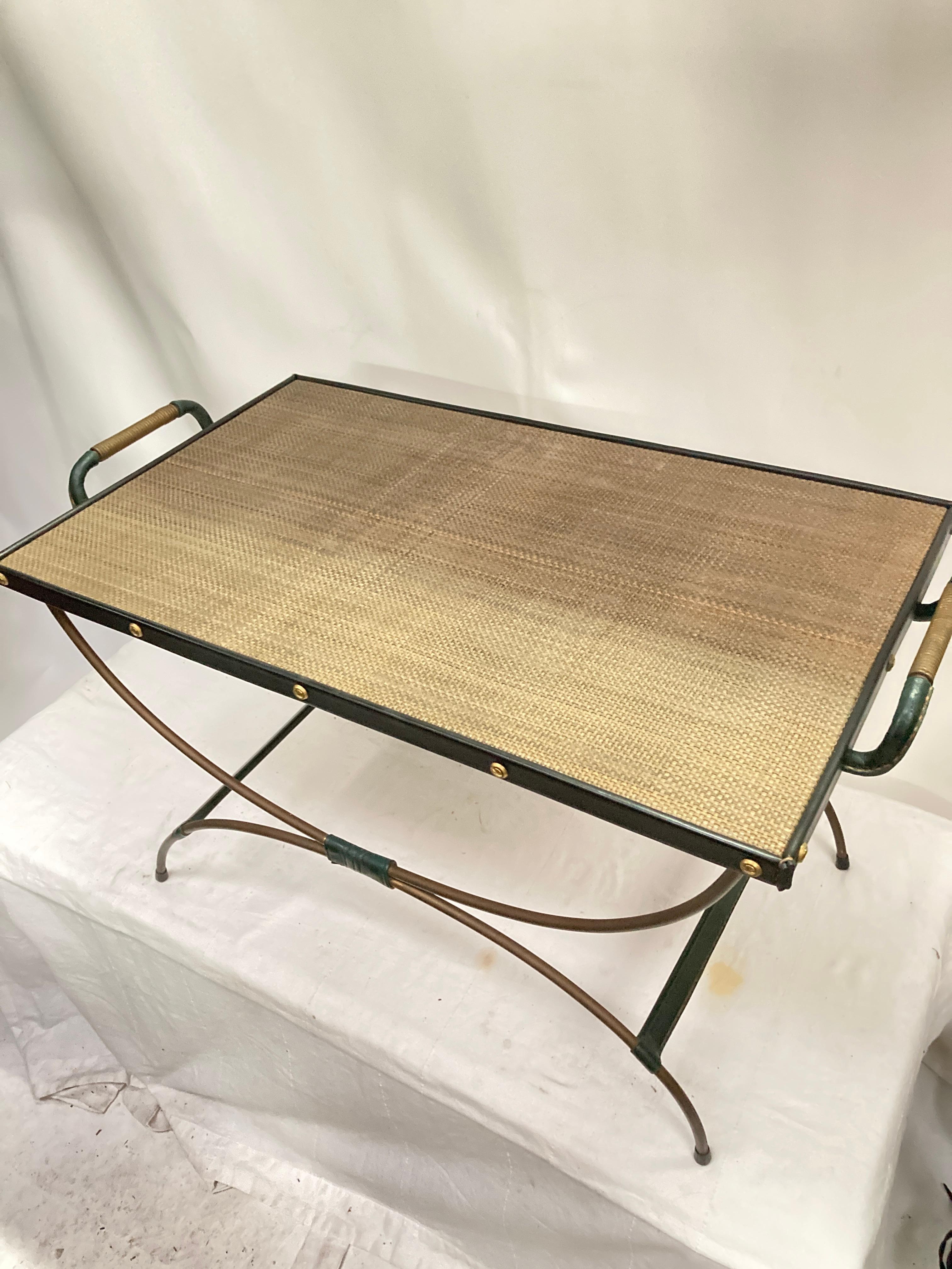 French 1950's Stitched leather an brass cocktail table By Jacques Adnet For Sale