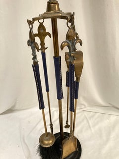 1950's Stitched leather and bronze fire stools by Jacques Adnet