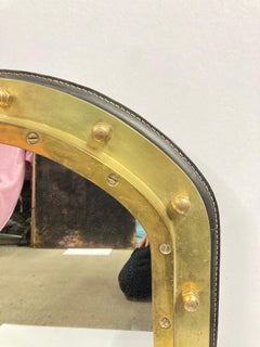1950's Stitched leather and bronze wall Mirror by Jacques Adnet