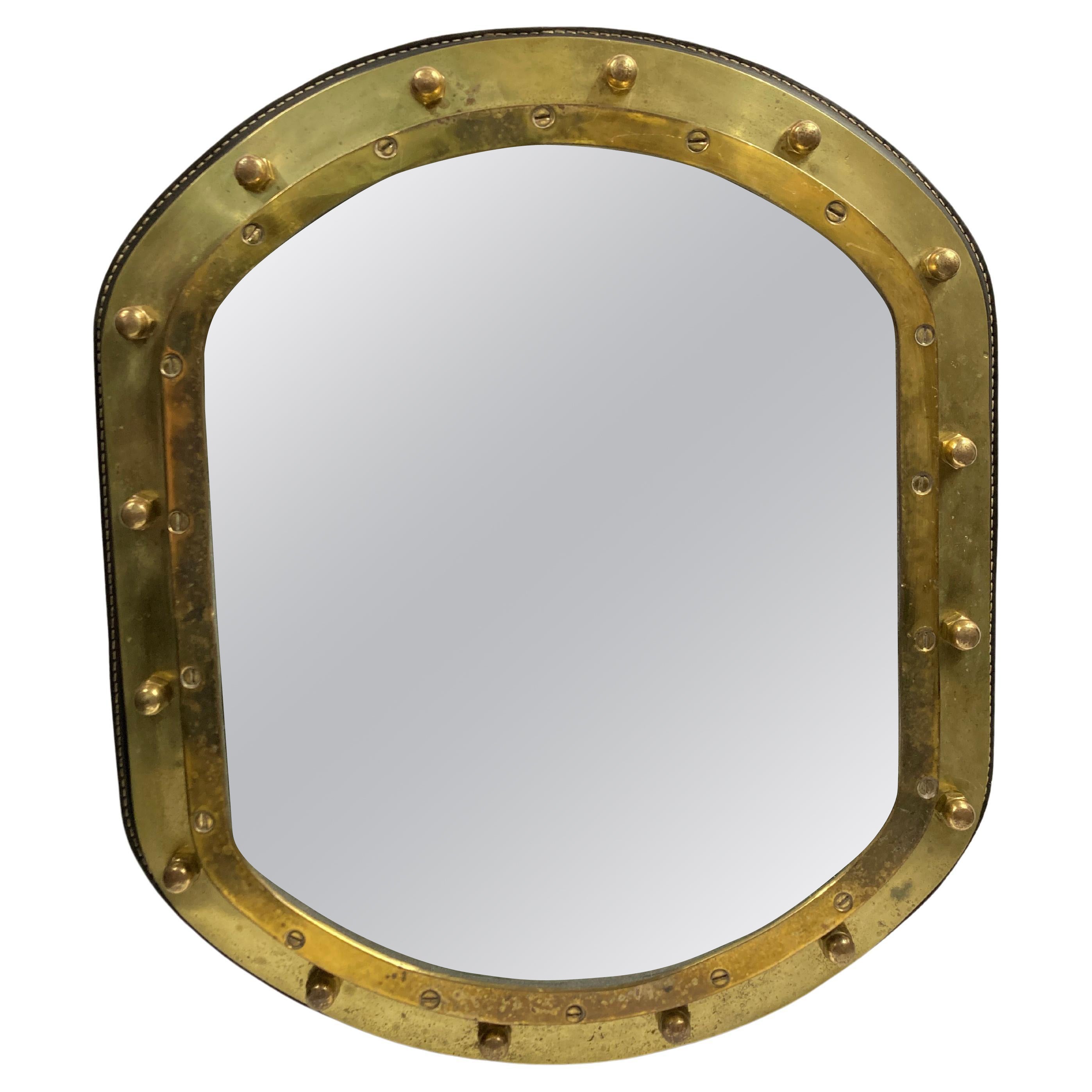 Miroir mural en cuir Stitch et bronze des années 50 par Jacques Adnet en vente