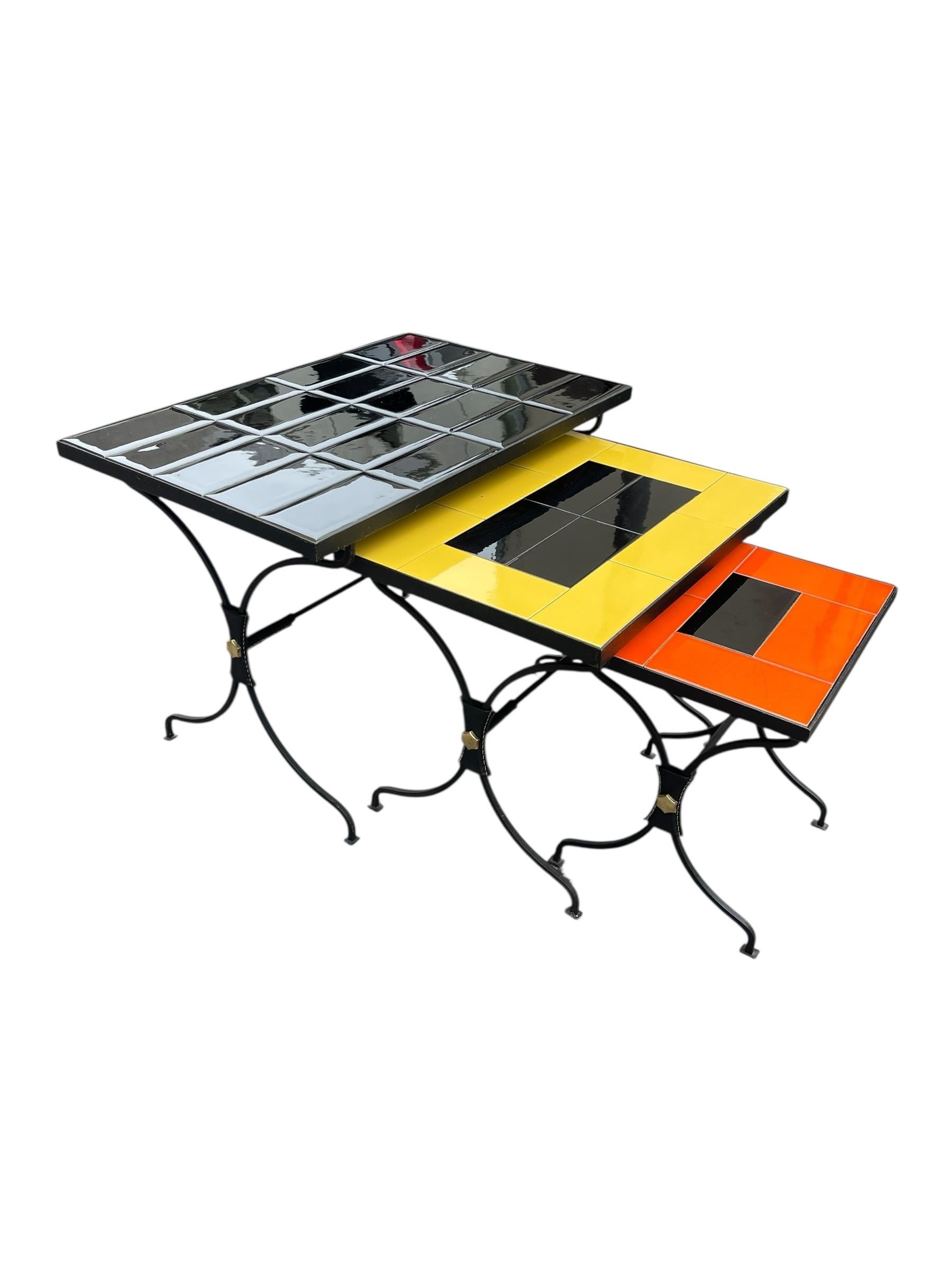 1950's Stitched leather and ceramic nesting tables by Jacques Adnet In Good Condition For Sale In Bois-Colombes, FR
