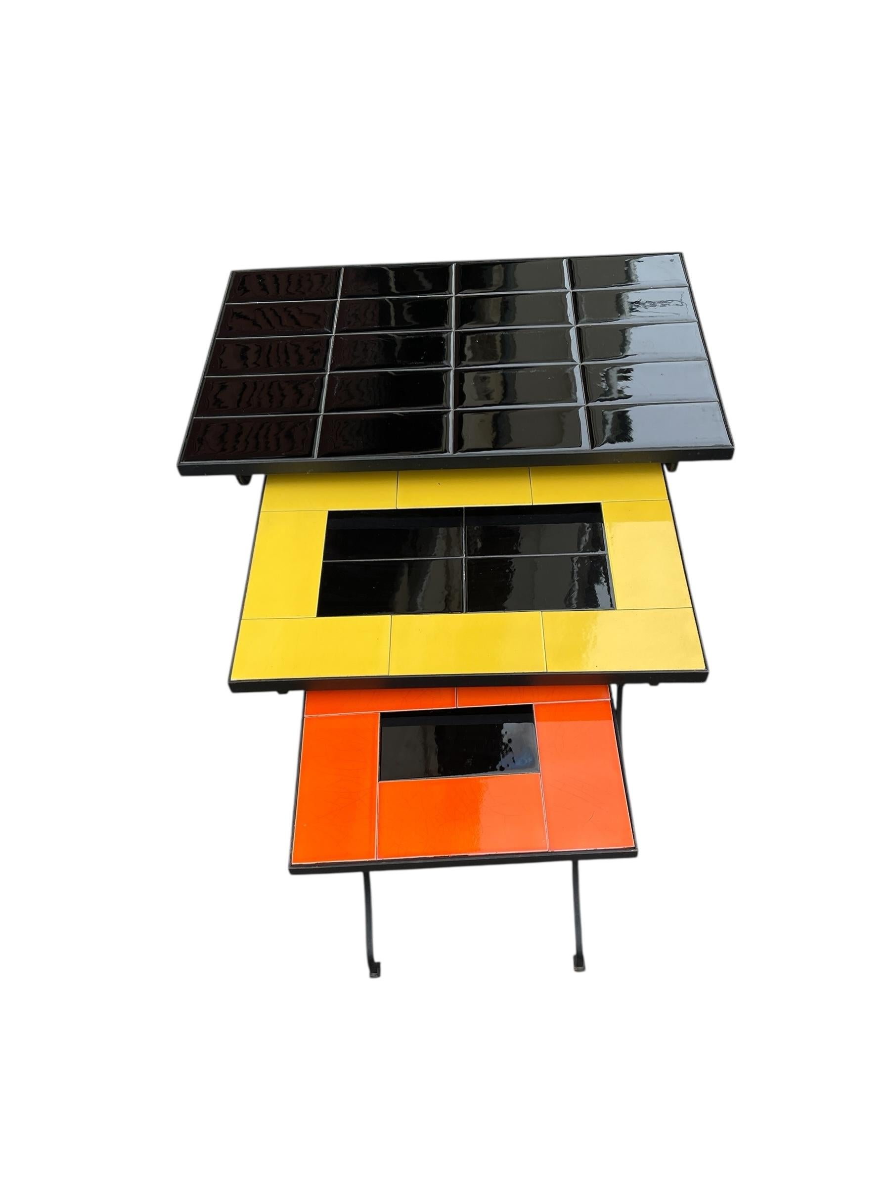 Mid-20th Century 1950's Stitched leather and ceramic nesting tables by Jacques Adnet For Sale
