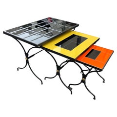 1950's Stitched leather and ceramic nesting tables by Jacques Adnet