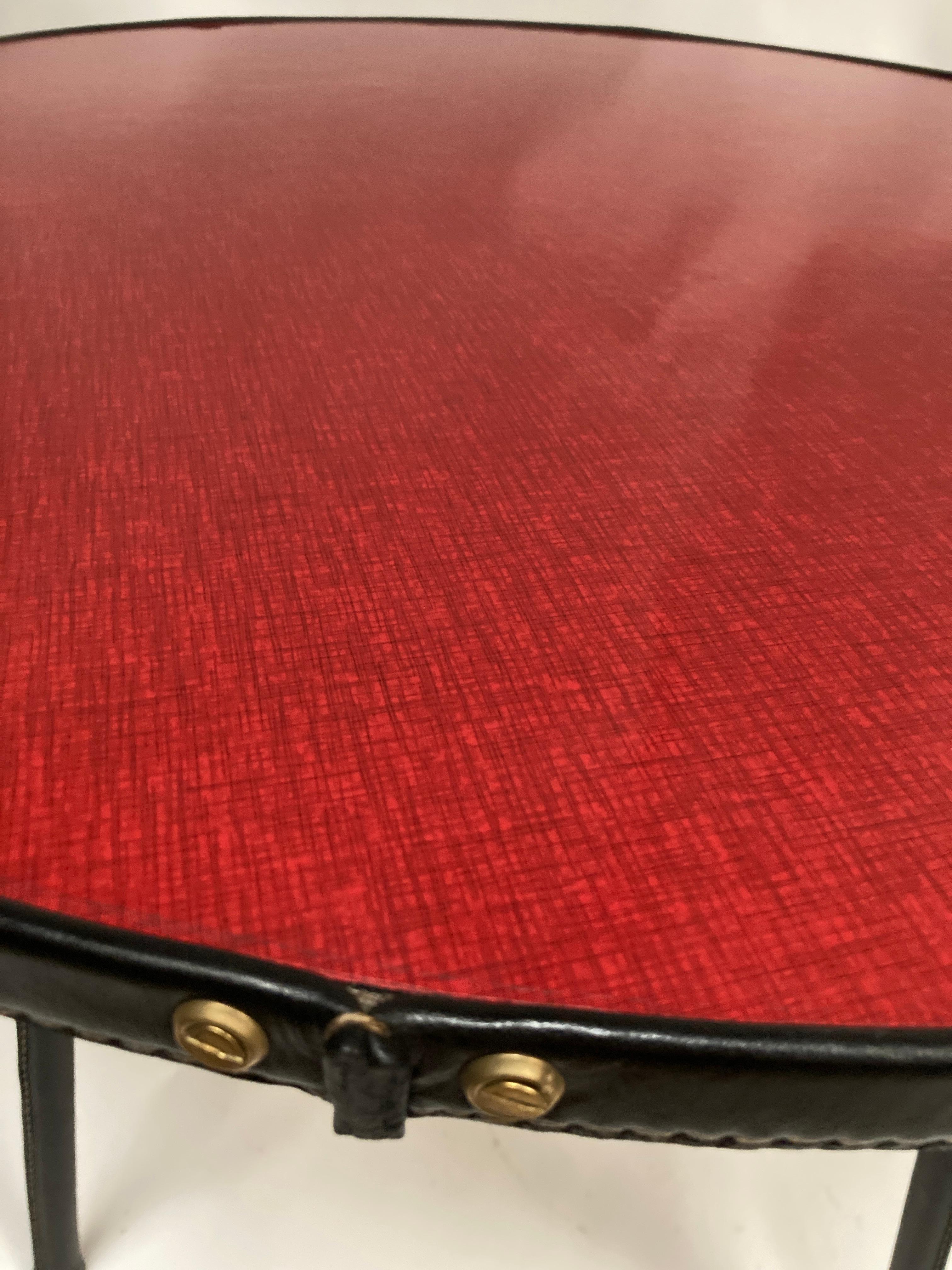 European 1950's Stitched Leather and formica Circular table by Jacques Adnet For Sale