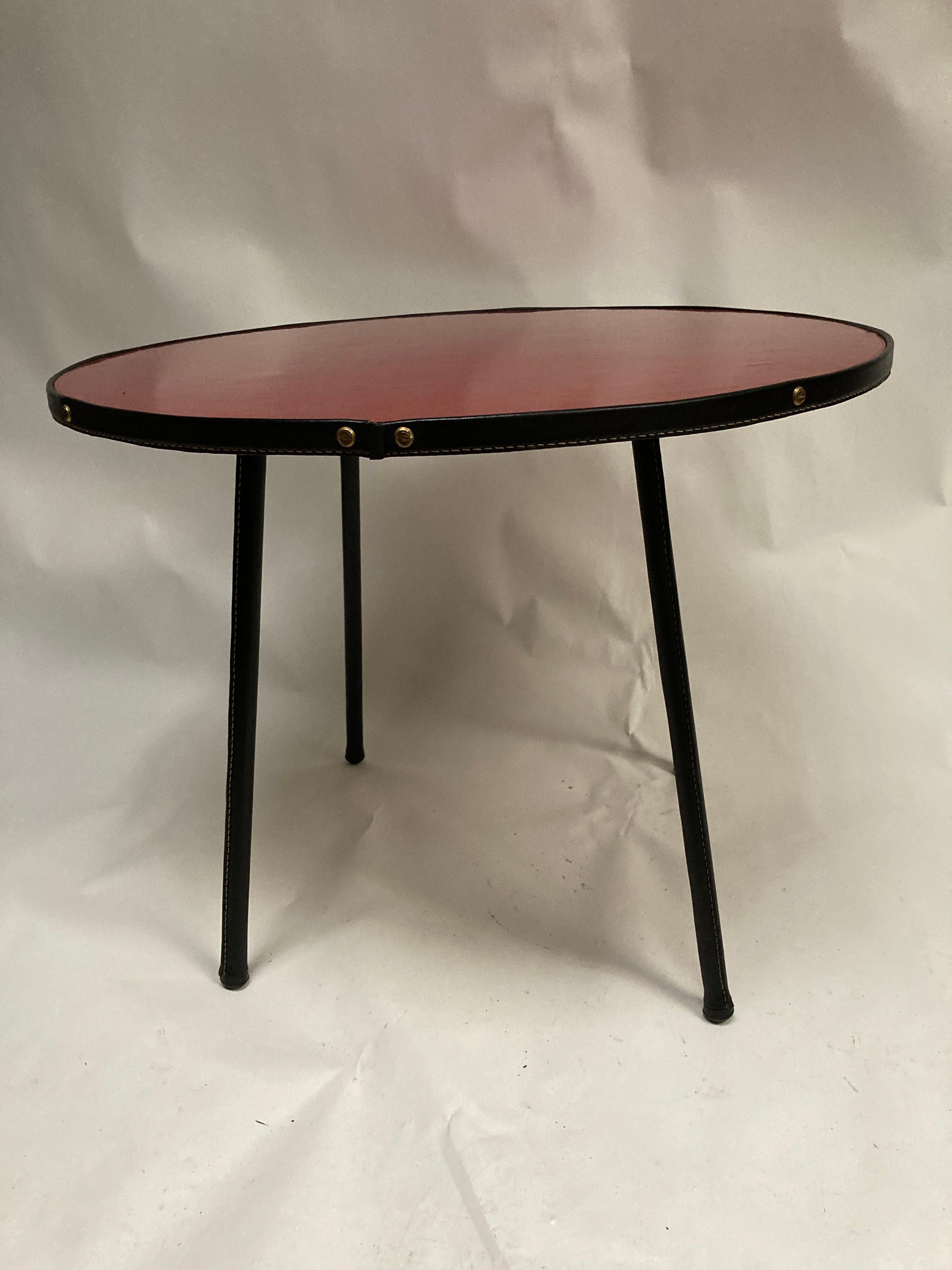 1950's Stitched Leather and formica Circular table by Jacques Adnet For Sale 2