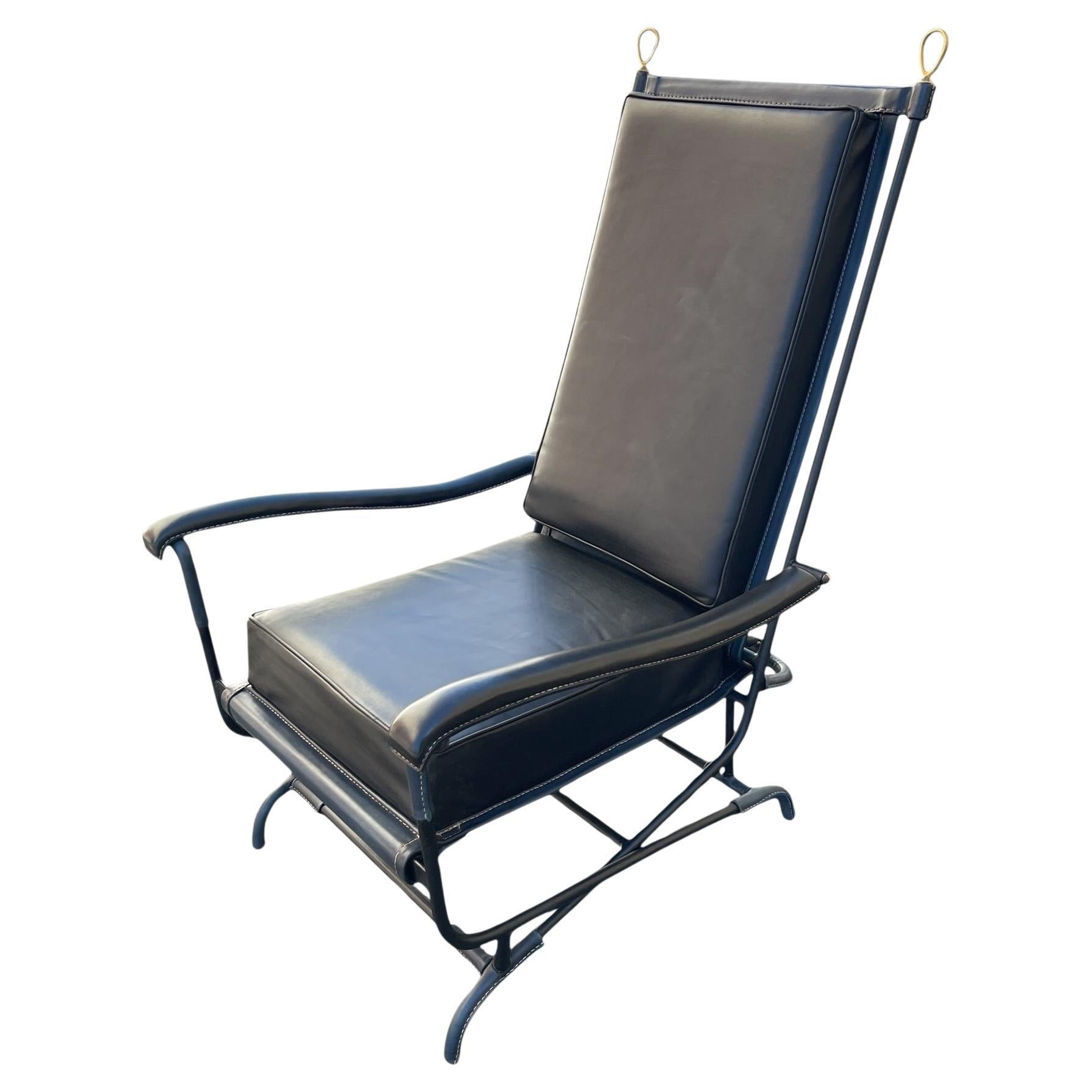 1950's Stitched leather and metal armchair by Jacques Adnet For Sale