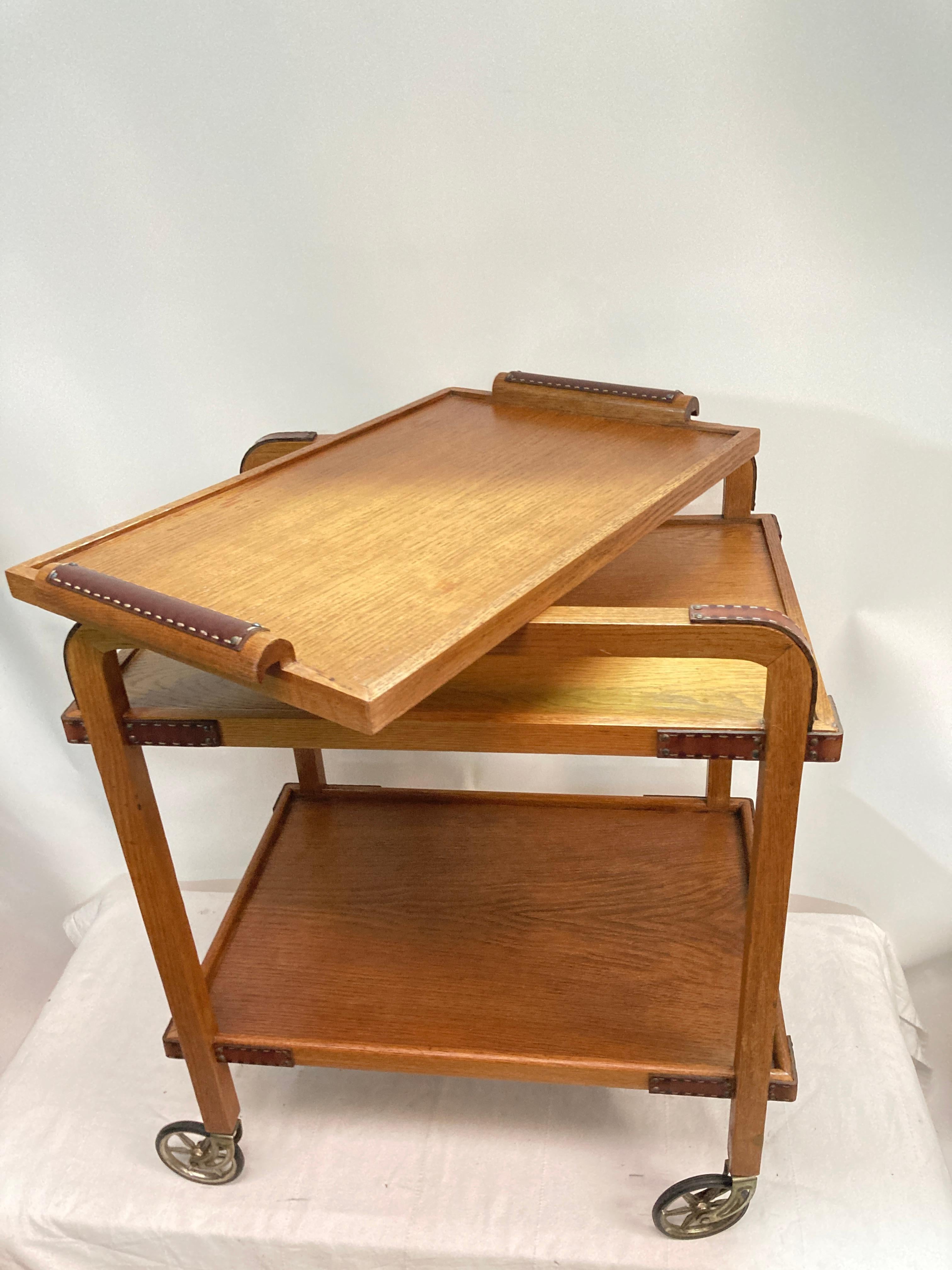 1950's Stitched leather and oak bar cart by Jacques Adnet For Sale 10