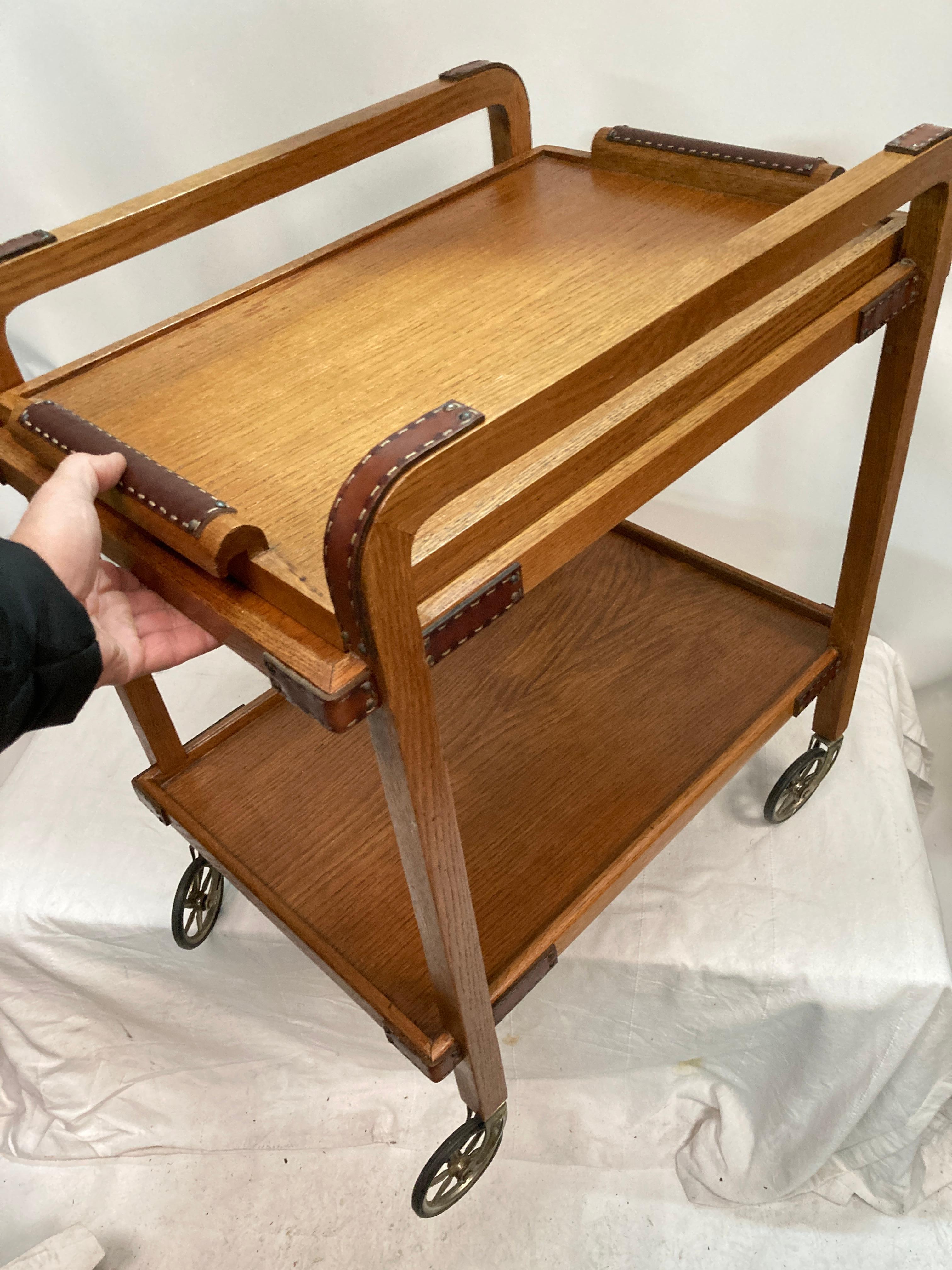 1950's Stitched leather and oak bar cart by Jacques Adnet For Sale 1
