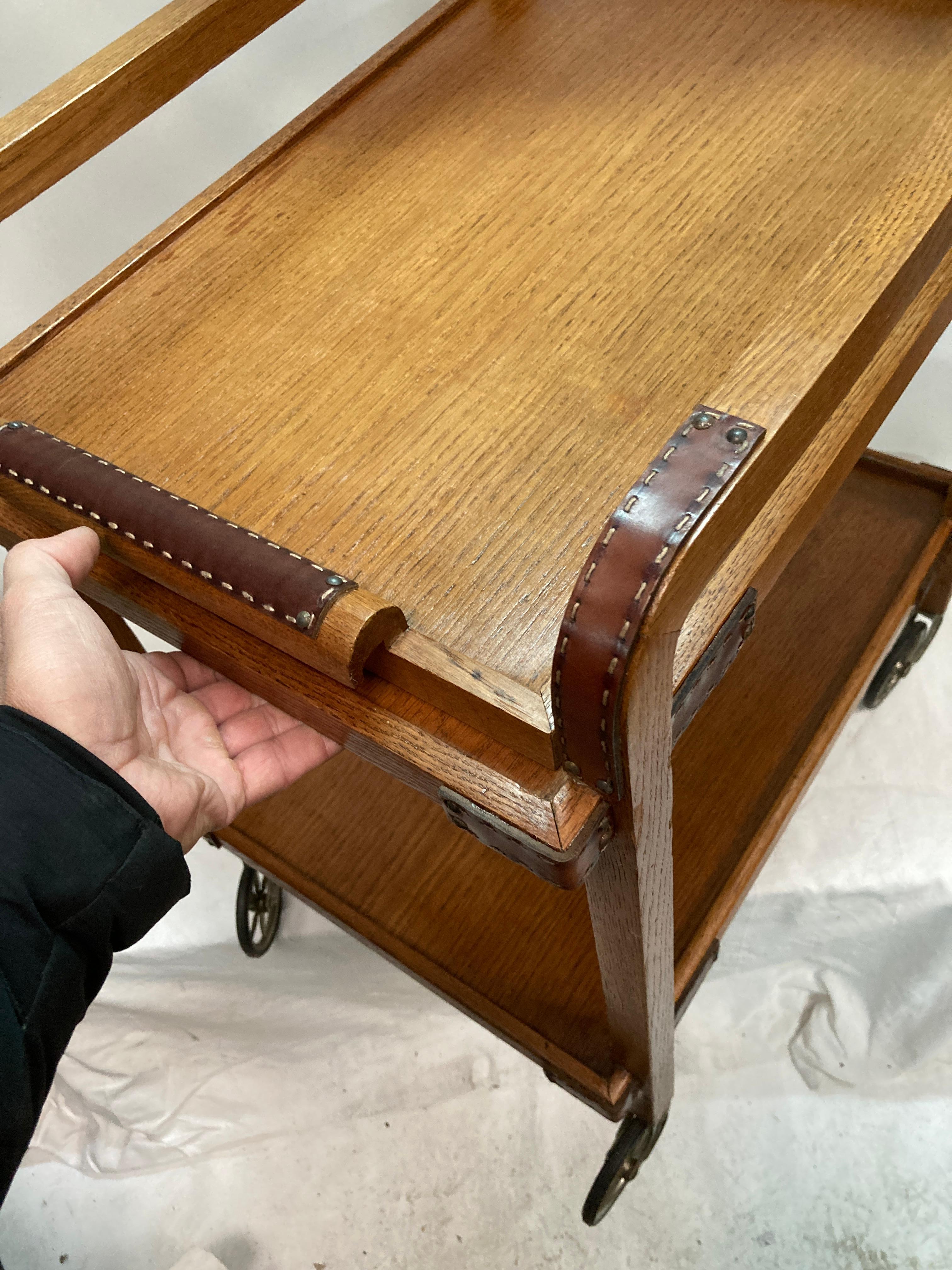 1950's Stitched leather and oak bar cart by Jacques Adnet For Sale 2