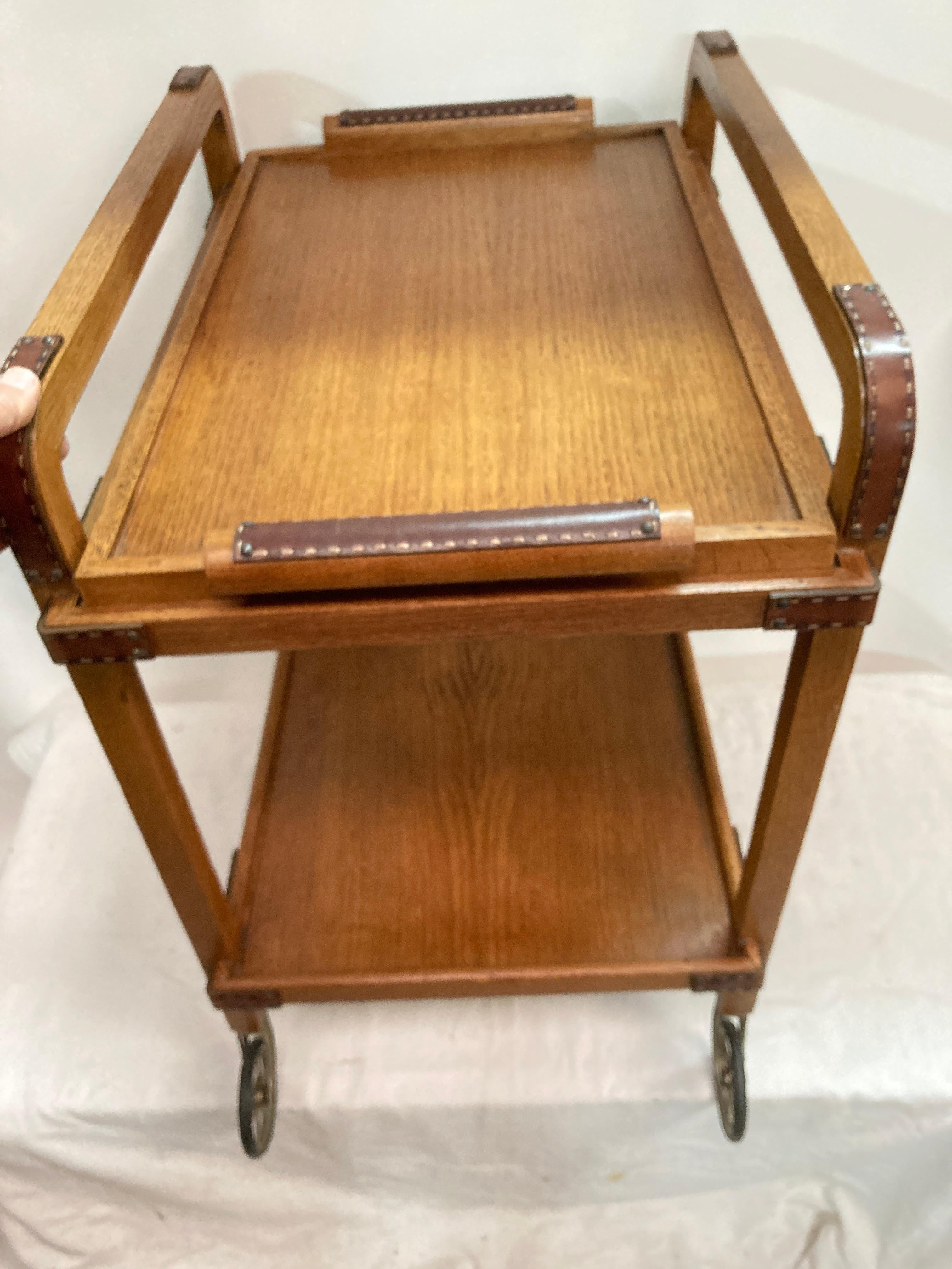 1950's Stitched leather and oak bar cart by Jacques Adnet For Sale 3