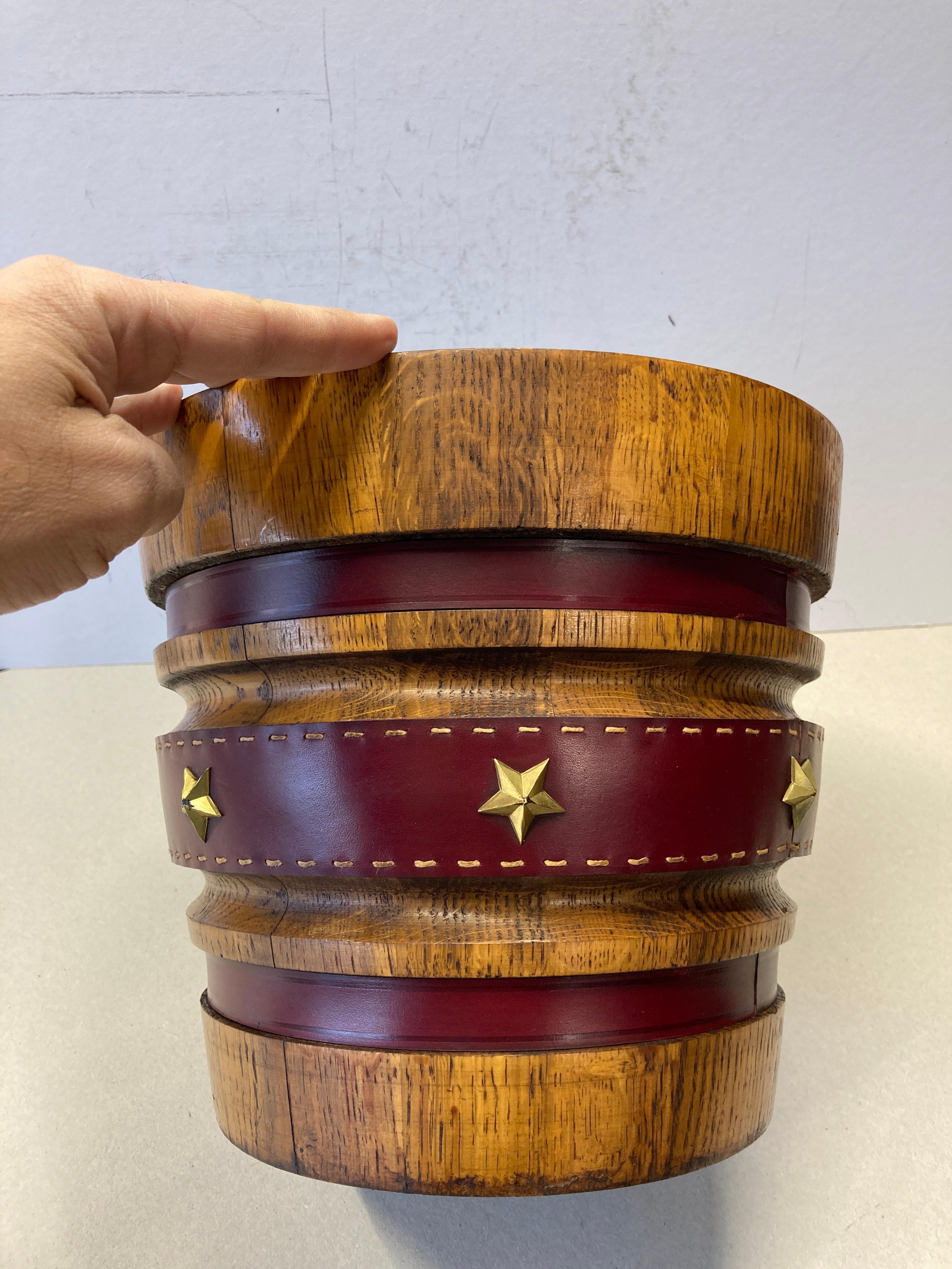 French 1950's Stitched leather and oak paper bin by Jacques Adnet For Sale
