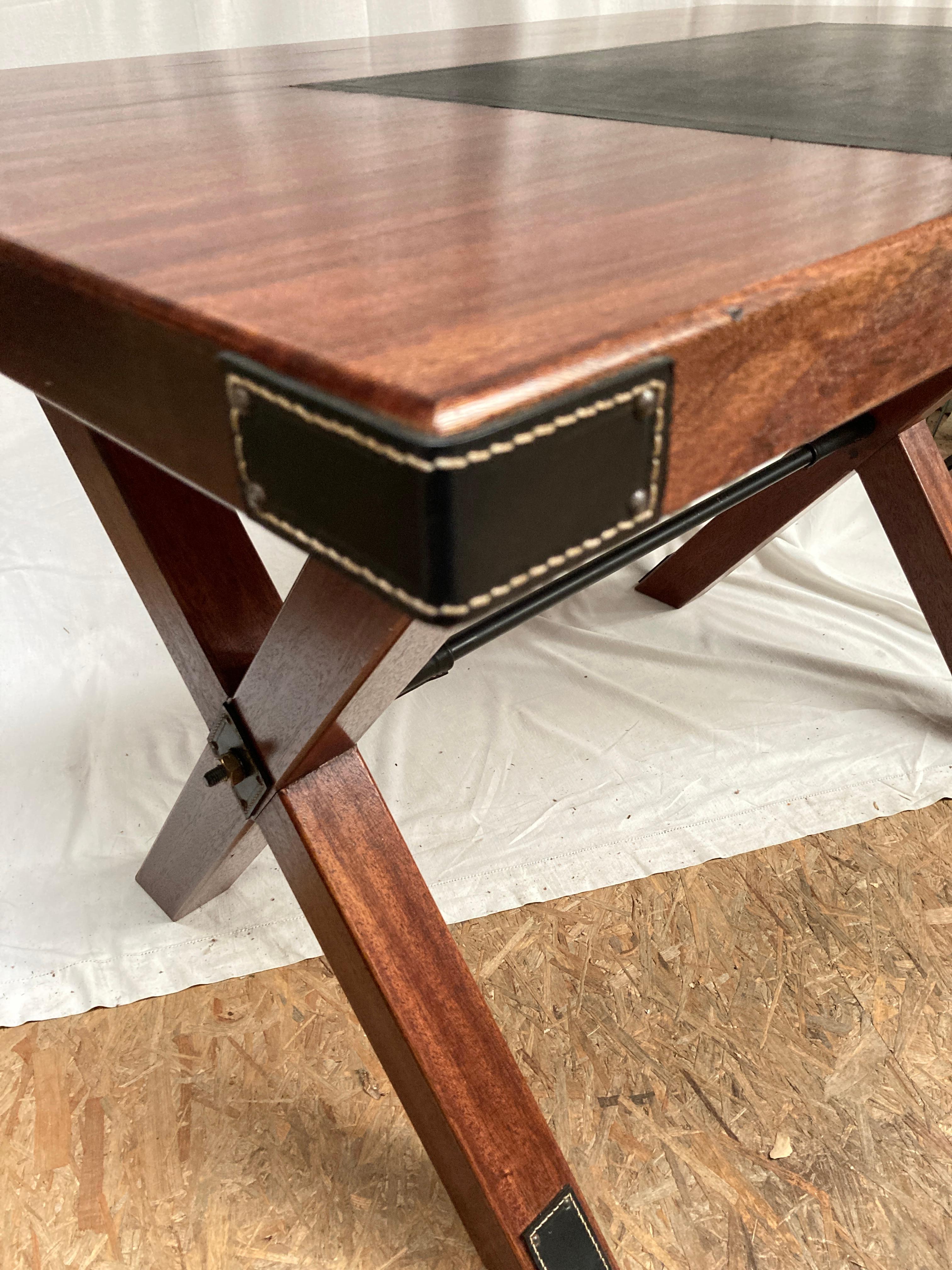 French 1950's Stitched leather and patinated pearwood writing table by Jacques Adnet For Sale
