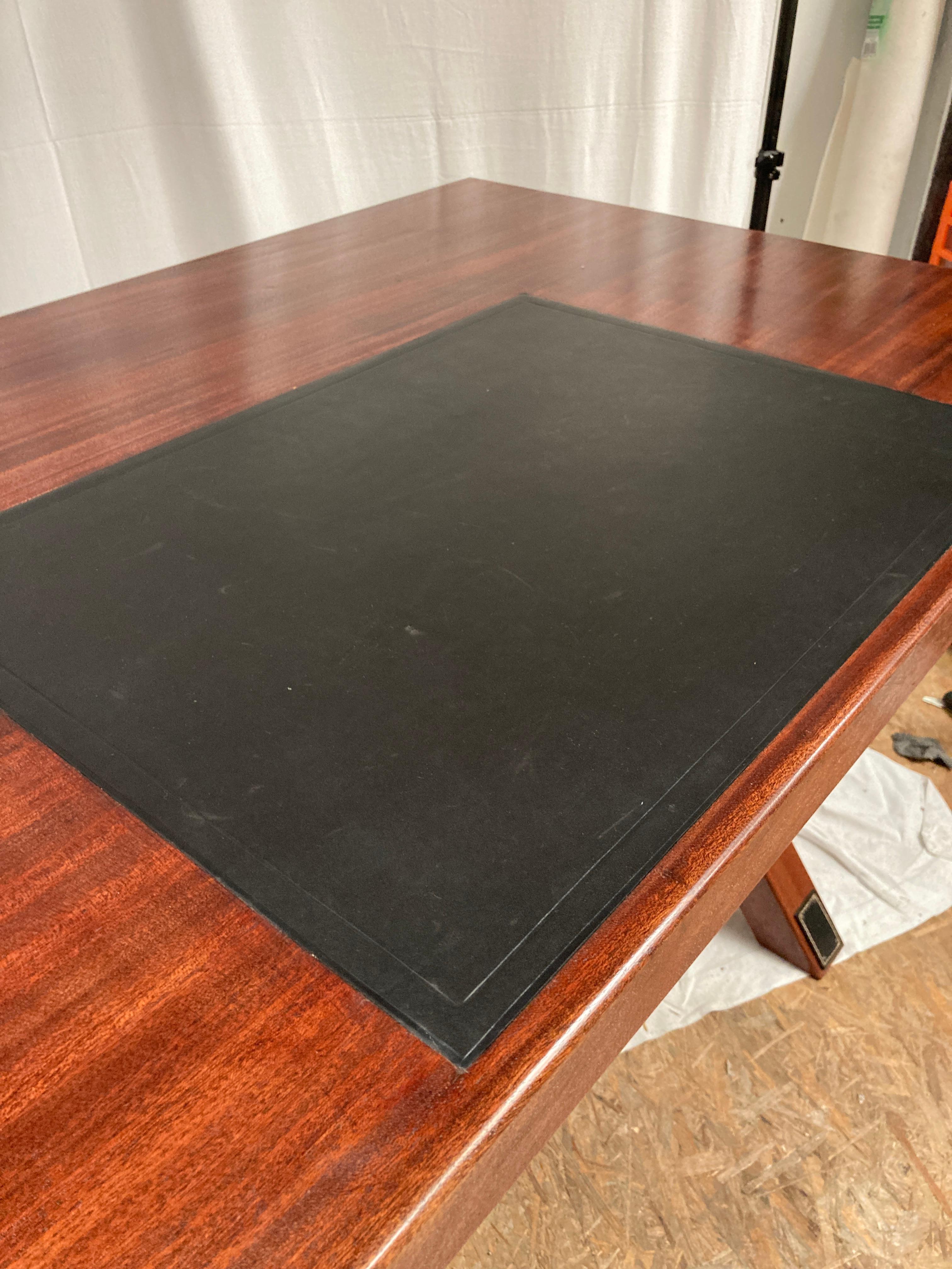 Leather 1950's Stitched leather and patinated pearwood writing table by Jacques Adnet For Sale