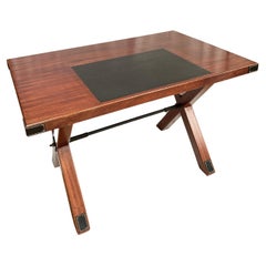 1950's Stitched leather and patinated pearwood writing table by Jacques Adnet