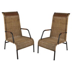 Vintage 1950's Stitched leather and rattan armchairs by Jacques Adnet