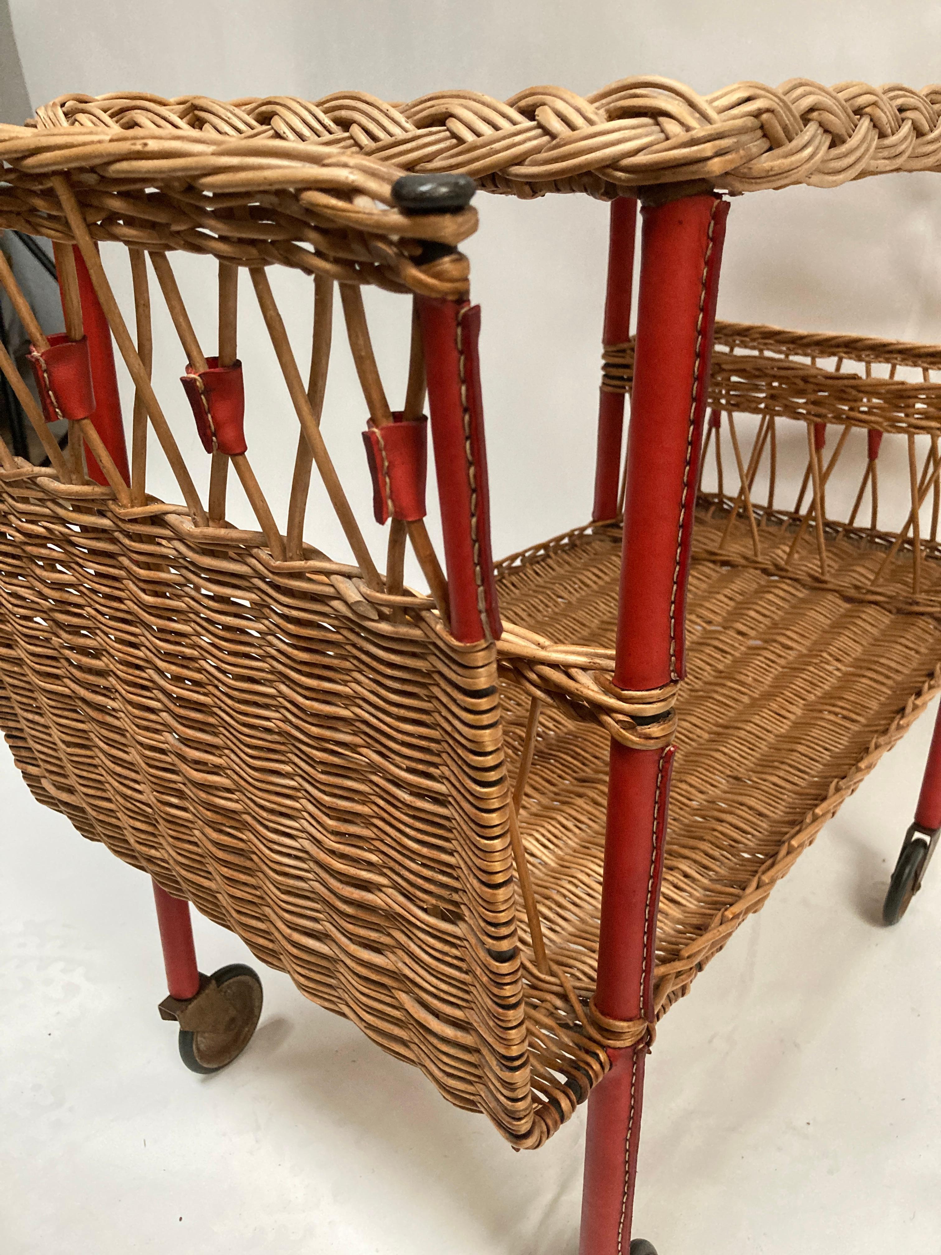 Leather 1950's Stitched leather and rattan bar cart by Jacques Adnet For Sale