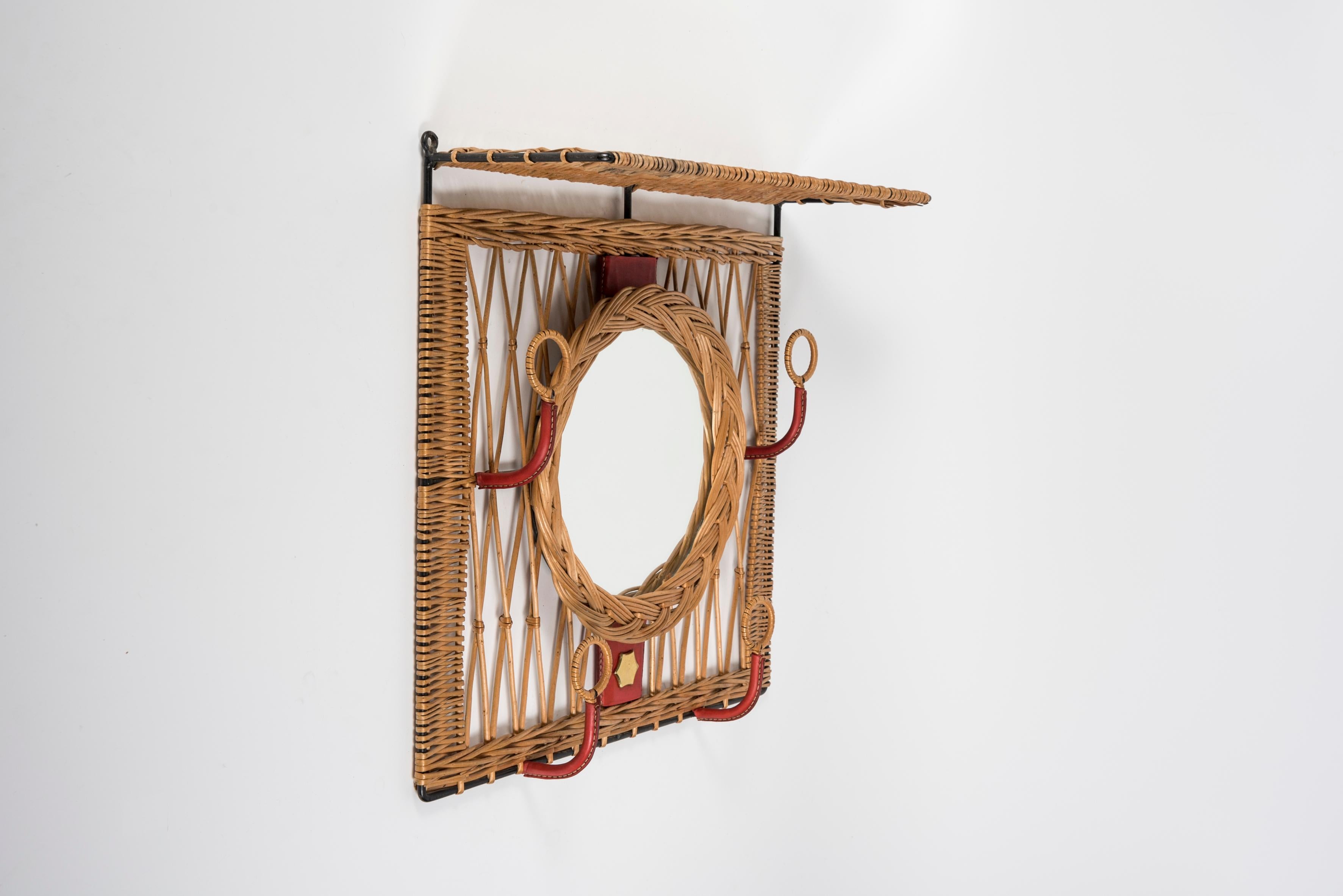 Mid-20th Century 1950's Stitched leather and rattan wall mirror by Jacques Adnet For Sale