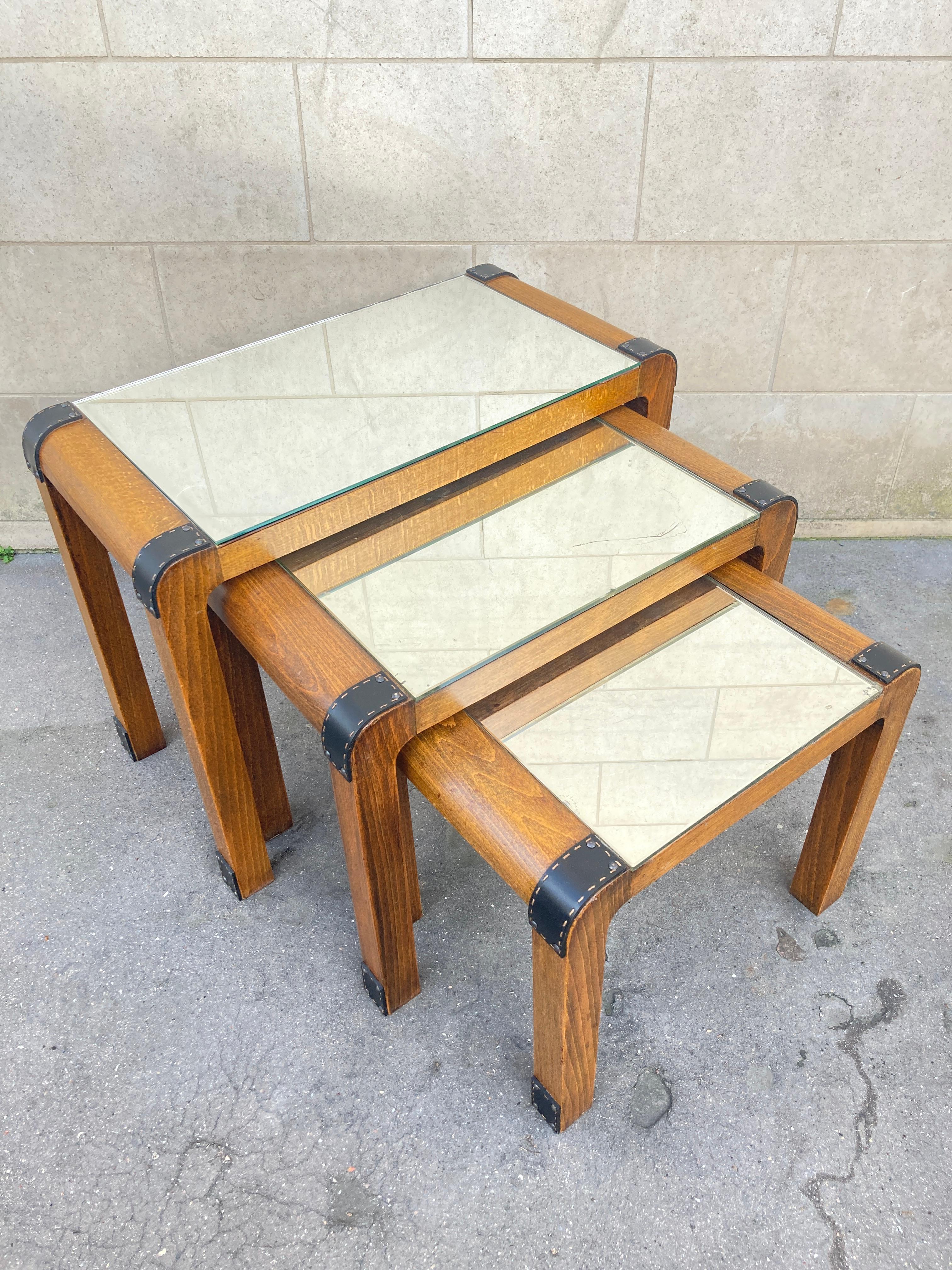 French 1950's Stitched leather and wood set of  nesting tables by Jacques Adnet For Sale